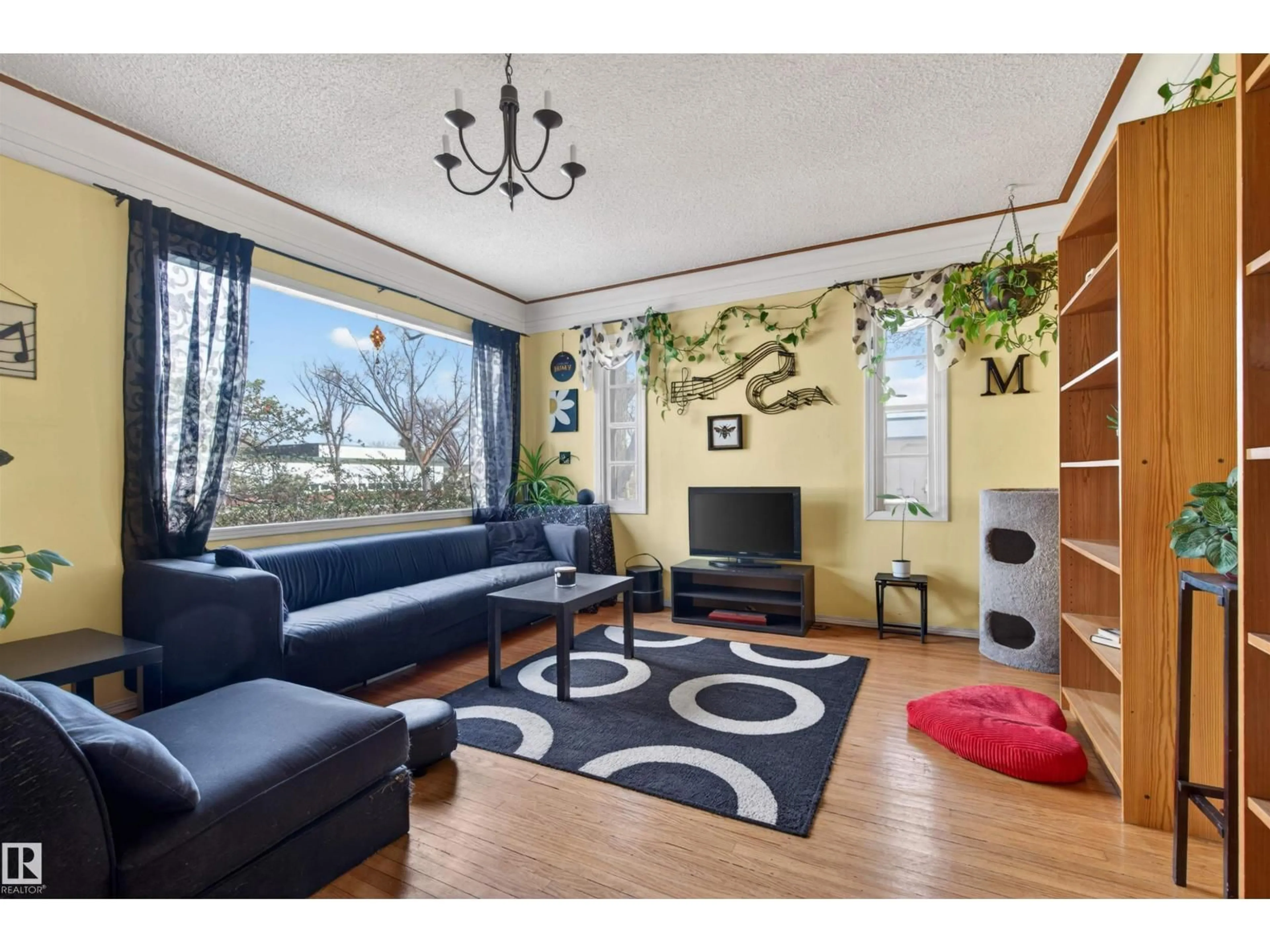 Living room with furniture, unknown for 6402 106 ST NW, Edmonton Alberta T6H2V4
