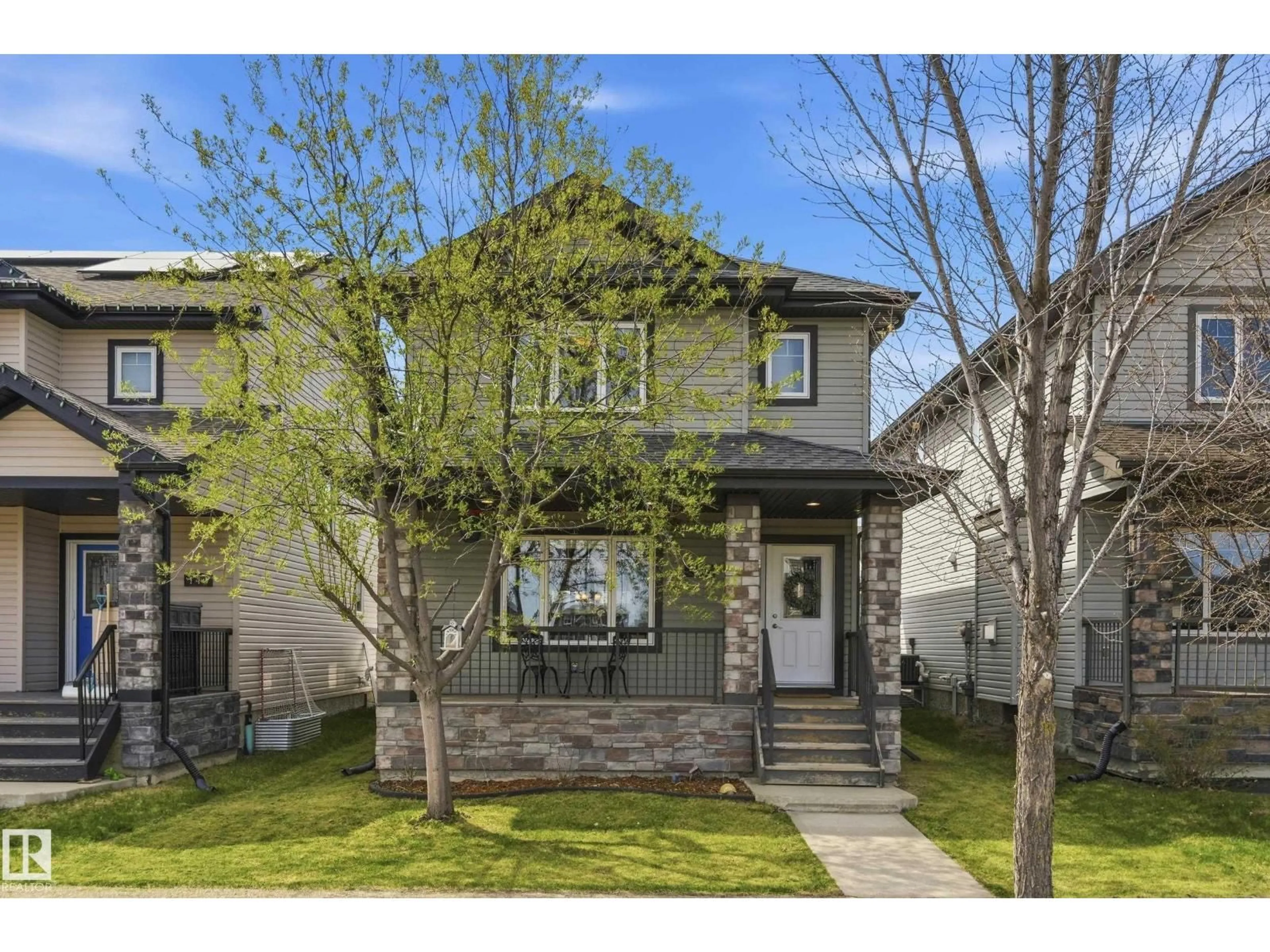 Home with vinyl exterior material, street for 140 ALLARD WY, Fort Saskatchewan Alberta T8L0N4