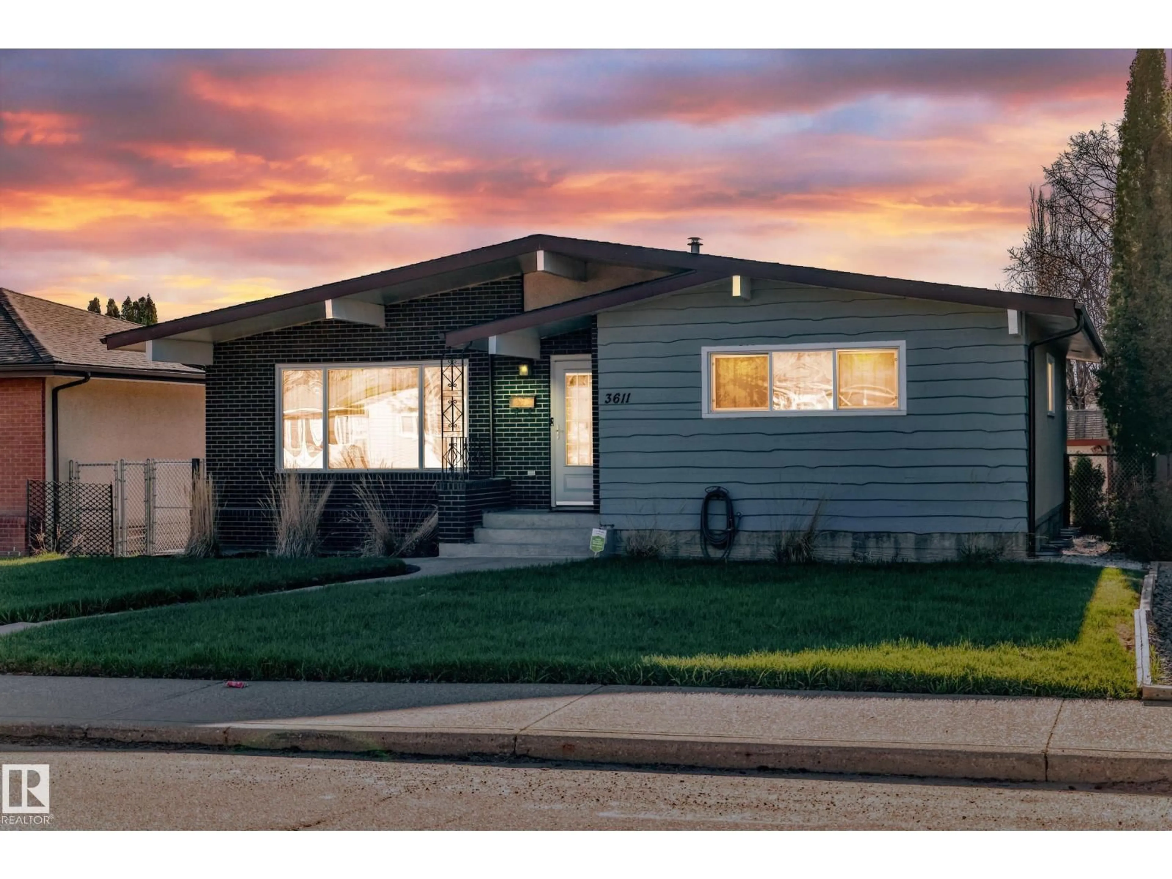 Home with vinyl exterior material, street for 3611 108 ST, Edmonton Alberta T6J1B3