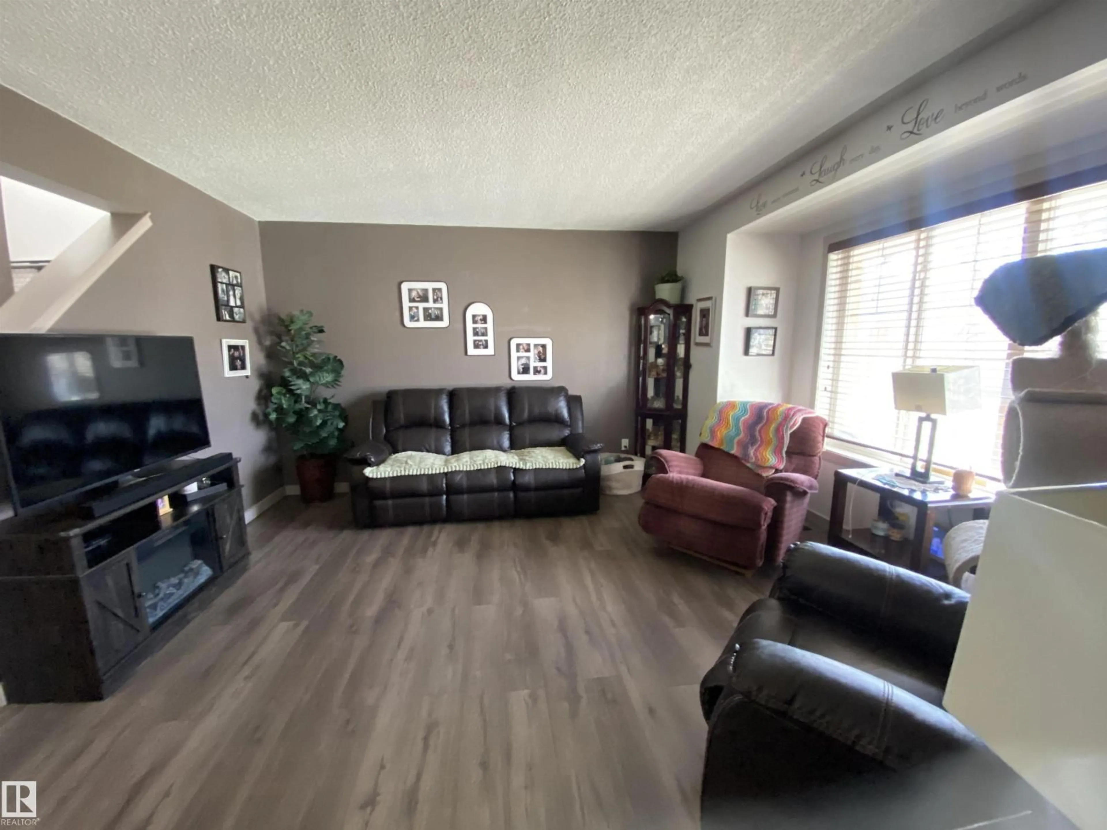 Living room with furniture, unknown for 1151 37 AV, Edmonton Alberta T6T0E8