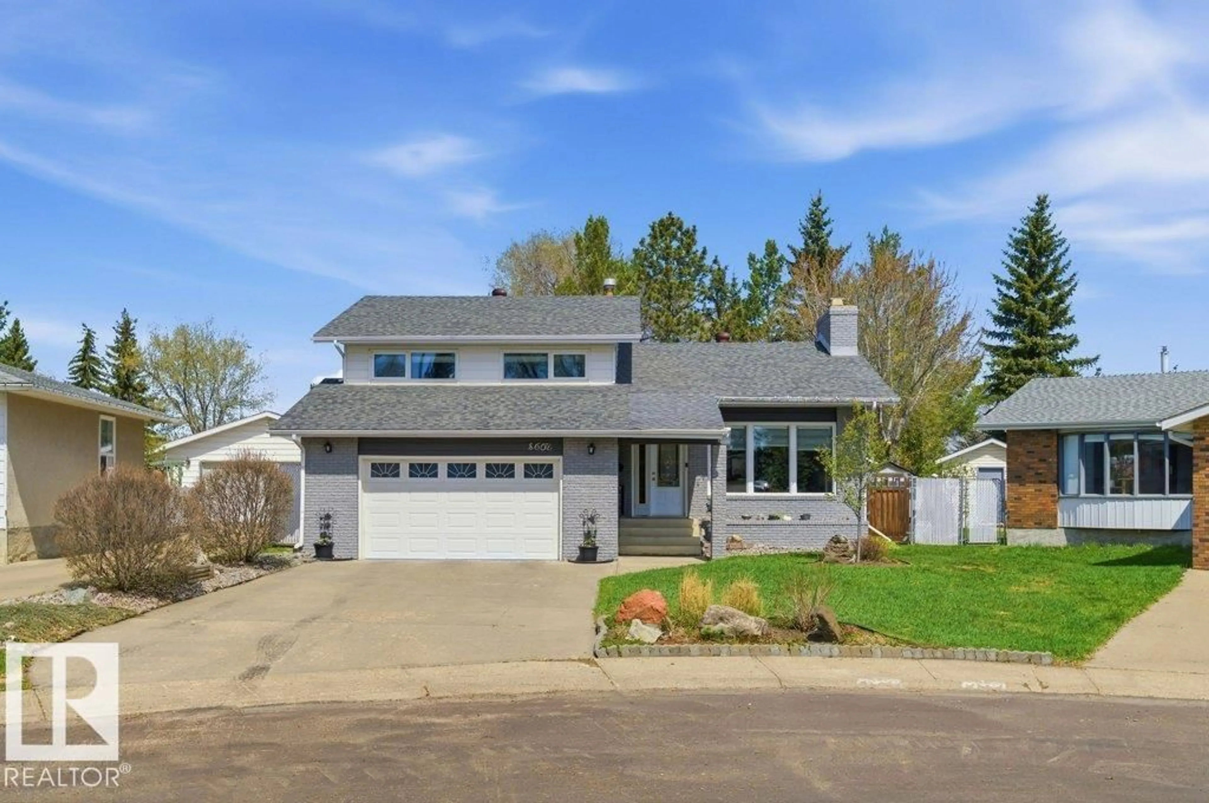 Home with vinyl exterior material, street for 8608 22 AVE, Edmonton Alberta T6K1Z8
