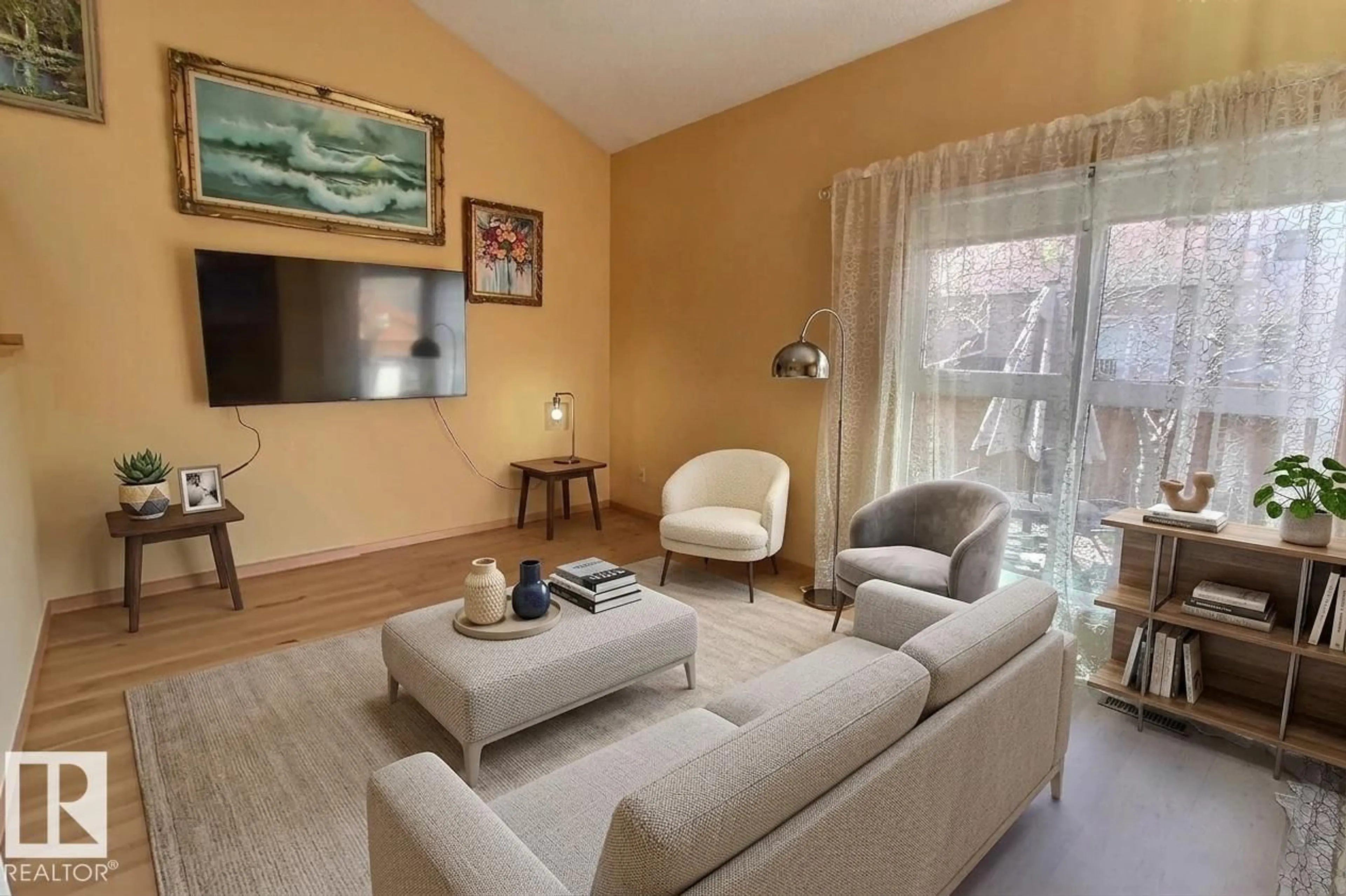 Living room with furniture, wood/laminate floor for 230 CHATEAU PL, Edmonton Alberta T5T1V3