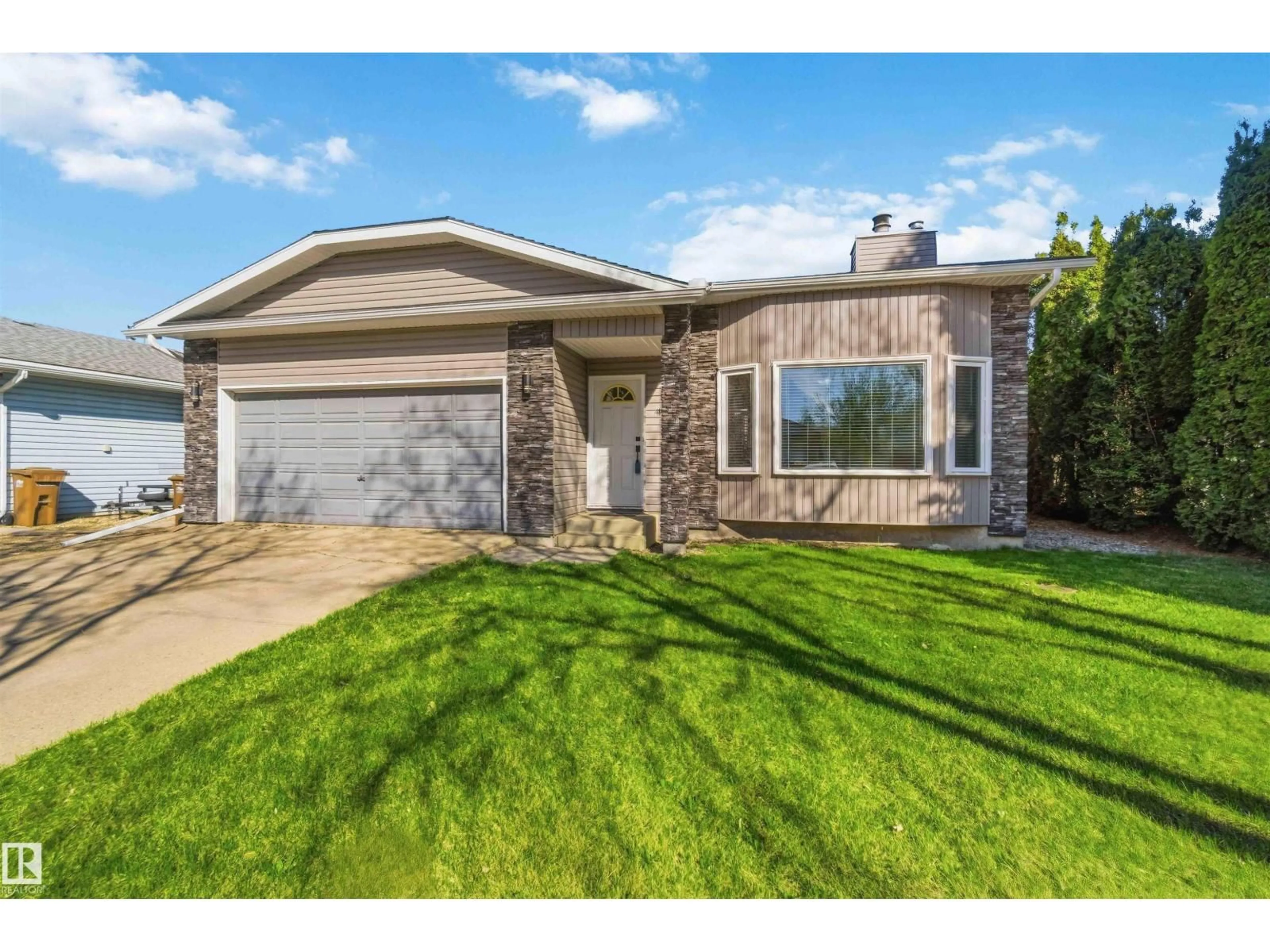 Home with vinyl exterior material, street for 42 PATTERSON CR, St. Albert Alberta T8N4T9