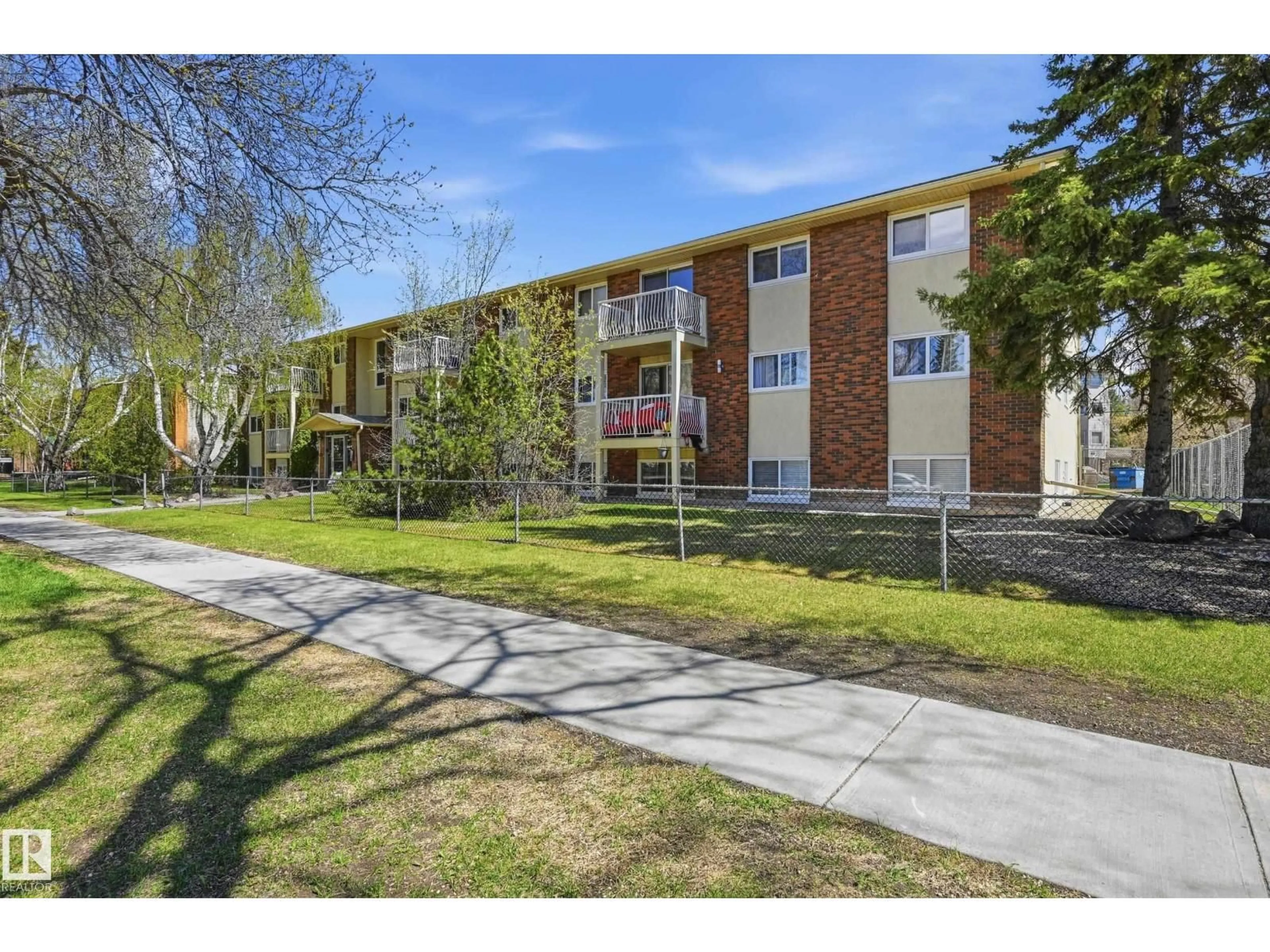 A pic from outside/outdoor area/front of a property/back of a property/a pic from drone, street for 305 - 10811 115 ST NW, Edmonton Alberta T5H3L2