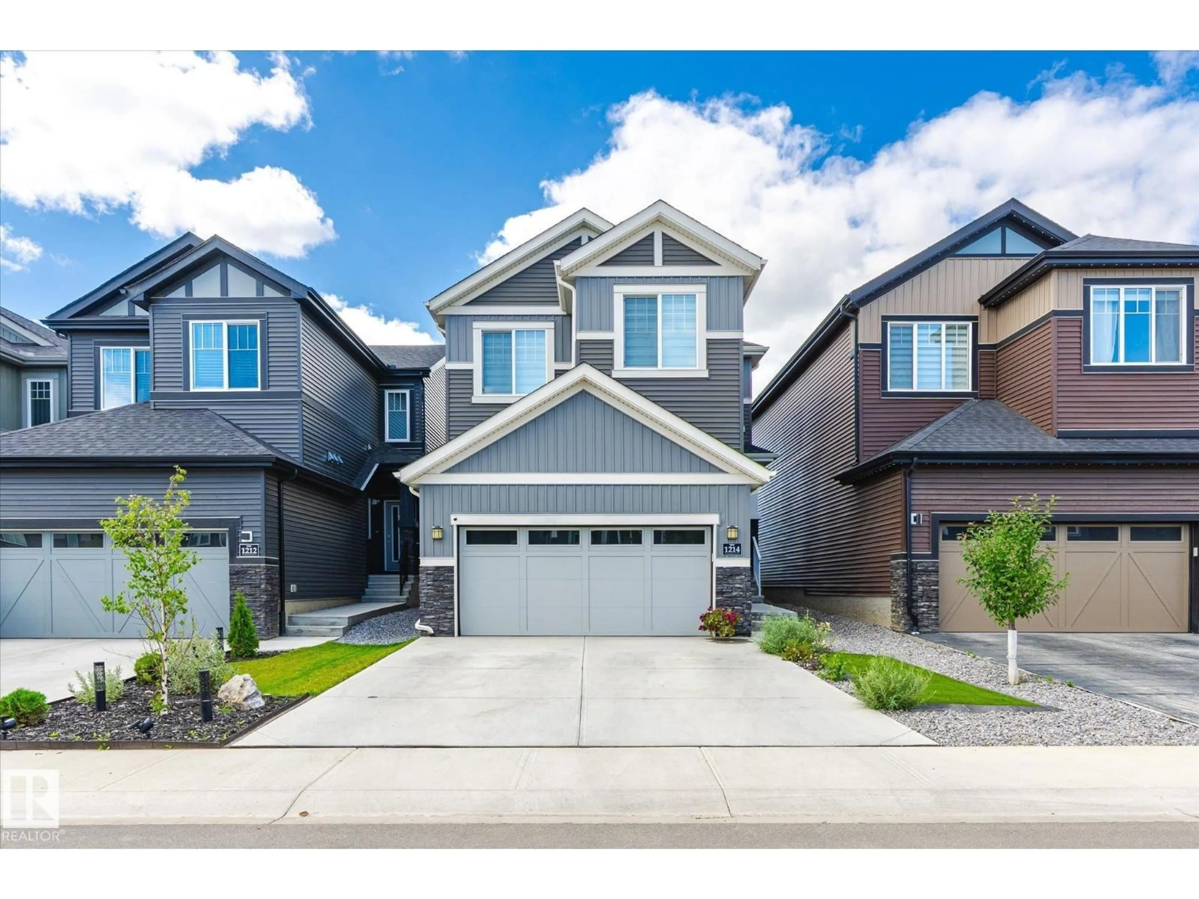 Home with brick exterior material, street for 1214 EATON LN, Edmonton Alberta T6M1M9