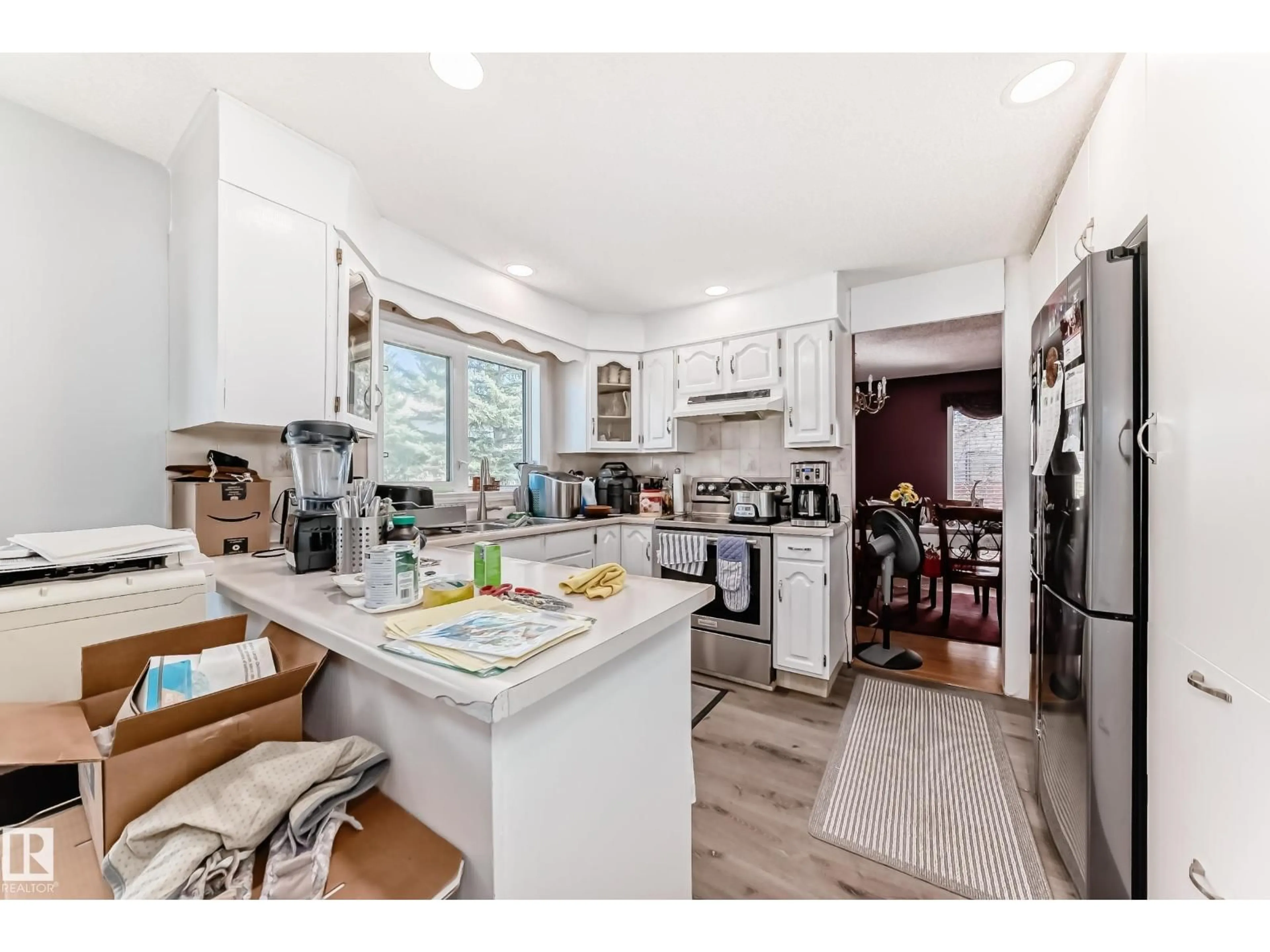 Open concept kitchen, ceramic/tile floor for 3923 149 ST, Edmonton Alberta T6R1J7