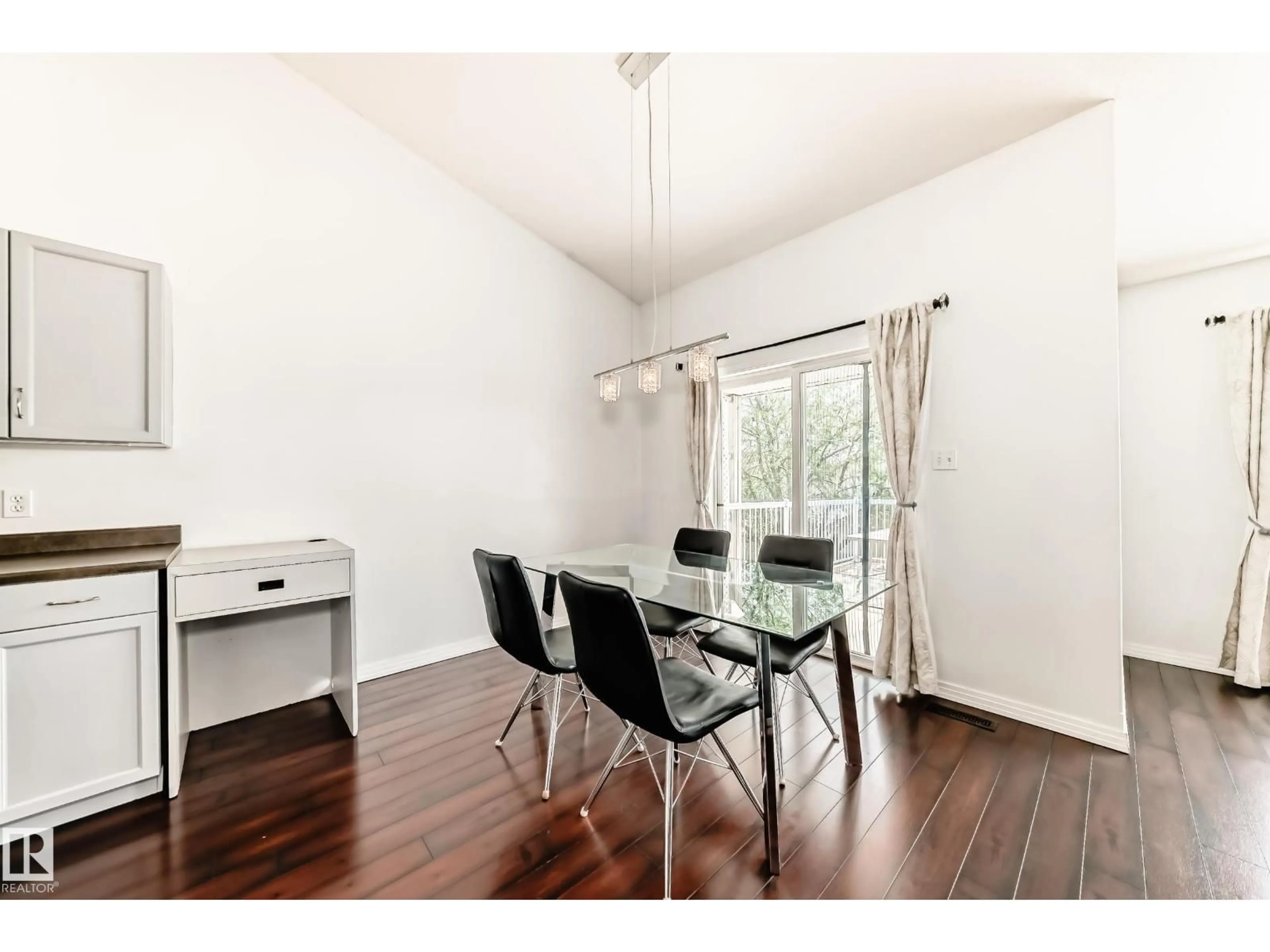 Dining room, wood/laminate floor for 4823 147 AV, Edmonton Alberta T5Y2X2
