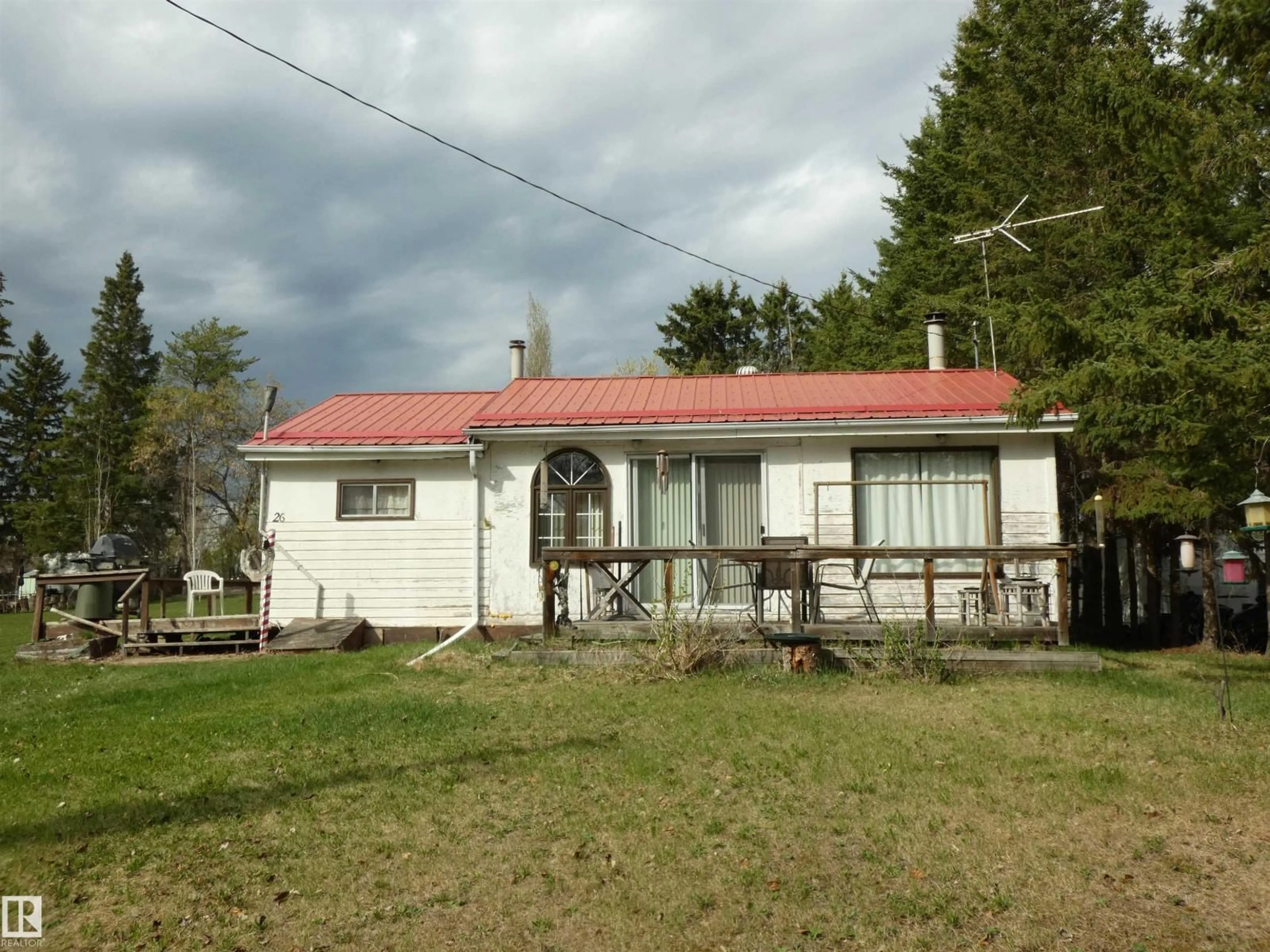 A pic from outside/outdoor area/front of a property/back of a property/a pic from drone, building for 706 MEADOW AV, Rural Barrhead County Alberta T0E1A0