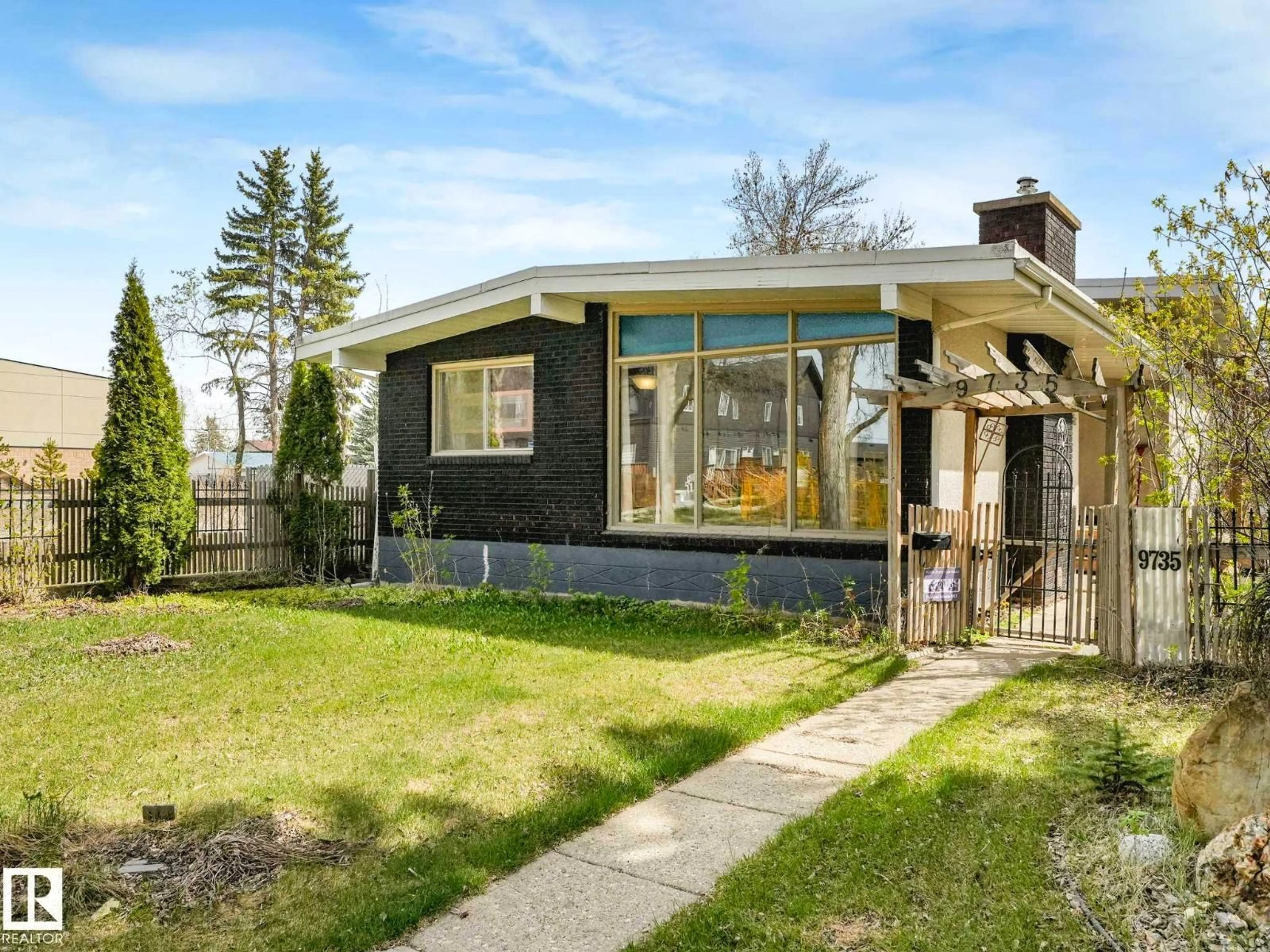 Home with vinyl exterior material, street for NW - 9735 155 ST, Edmonton Alberta T5P2K8