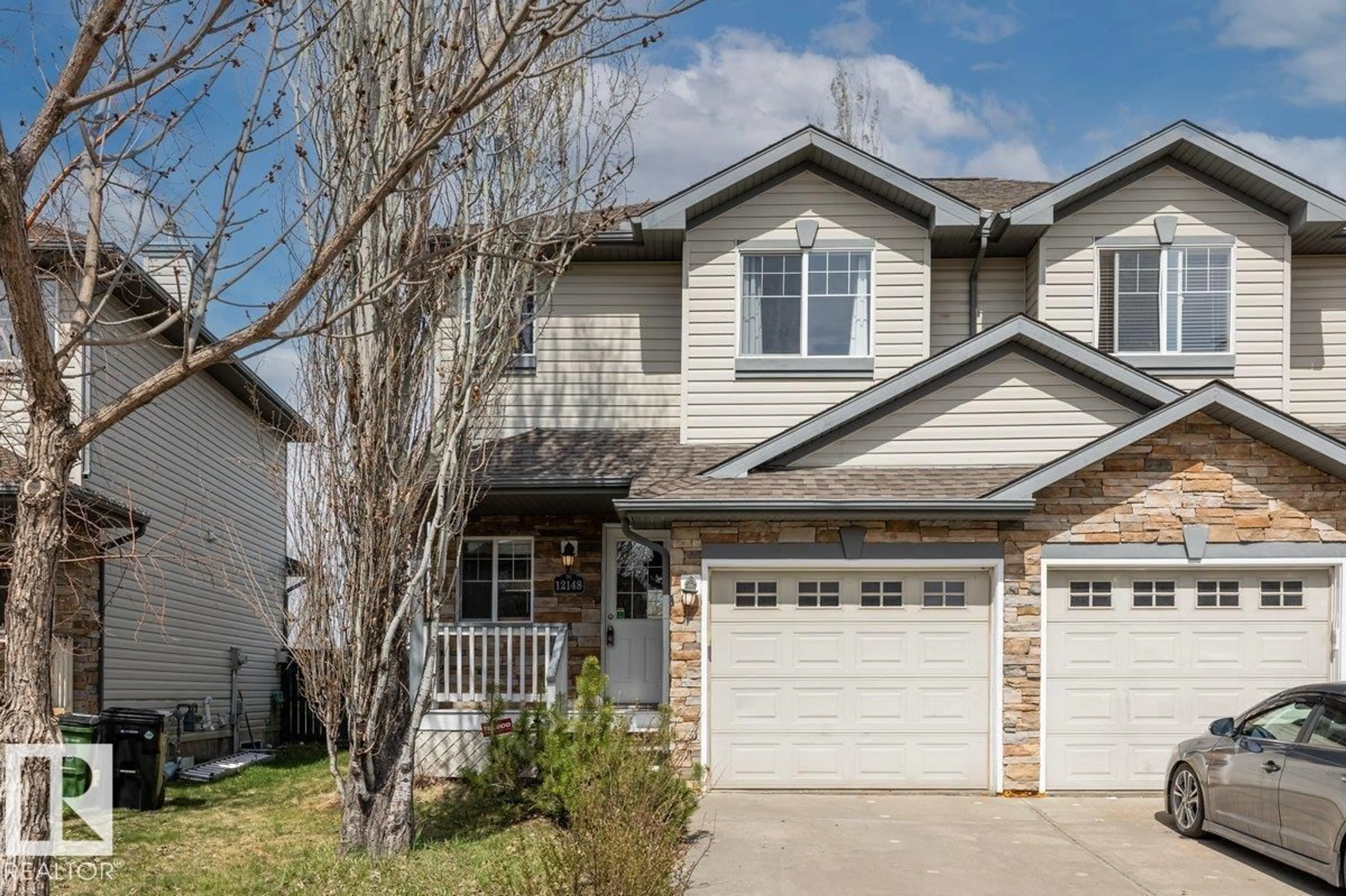 Home with vinyl exterior material, street for SW - 12148 16 AV, Edmonton Alberta T6W1L8