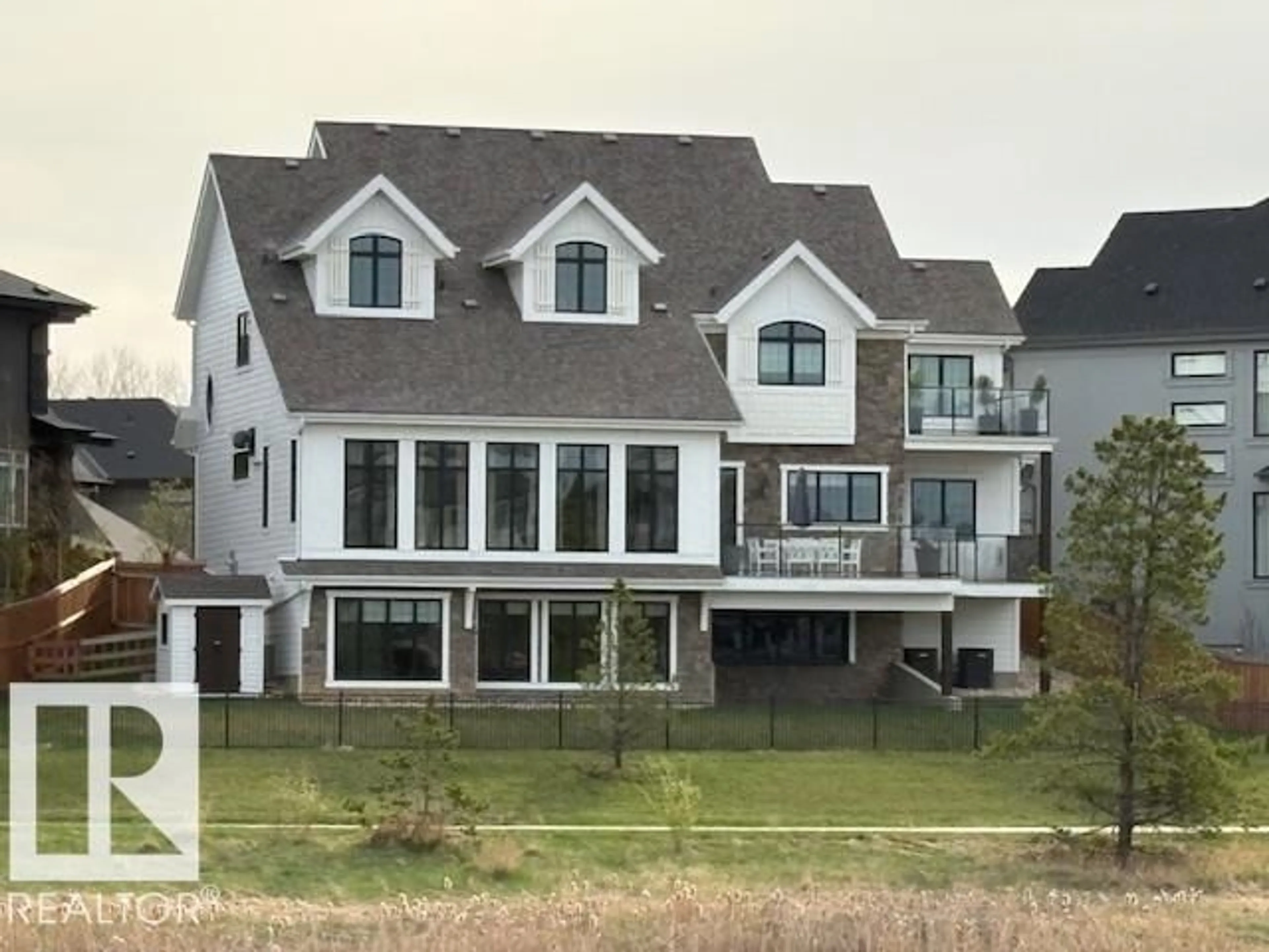 Home with vinyl exterior material, water/lake/river/ocean view for 5621 CAUTLEY CV, Edmonton Alberta T6W4P7
