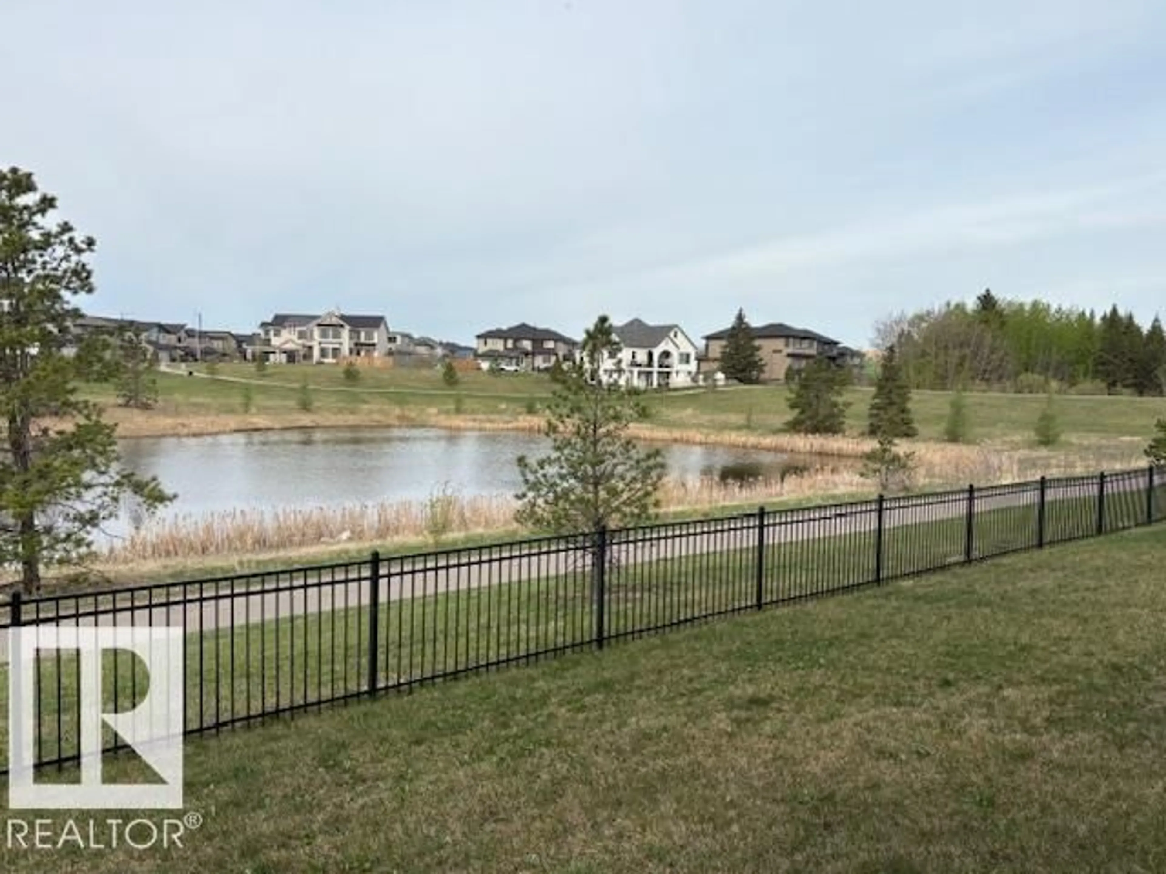 A pic from outside/outdoor area/front of a property/back of a property/a pic from drone, water/lake/river/ocean view for 5621 CAUTLEY CV, Edmonton Alberta T6W4P7