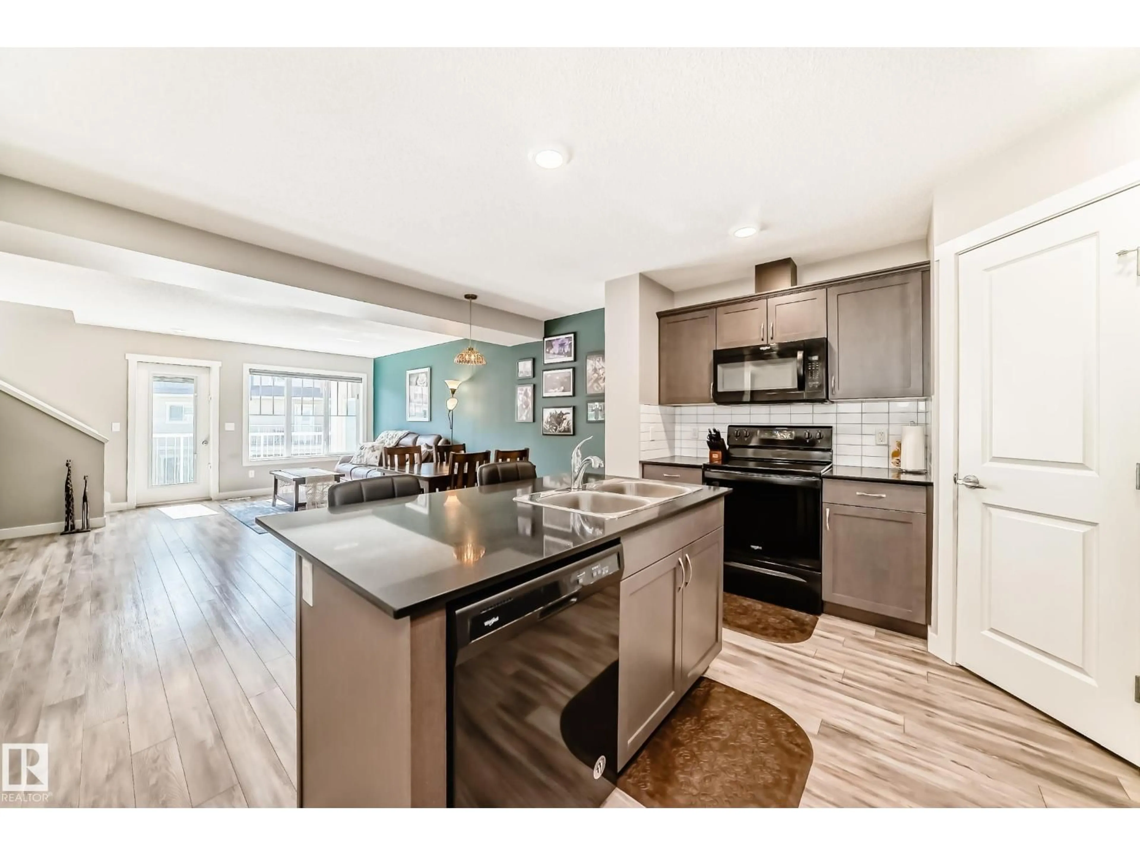 Open concept kitchen, unknown for #108 - 17832 78 ST, Edmonton Alberta T5Z0L7