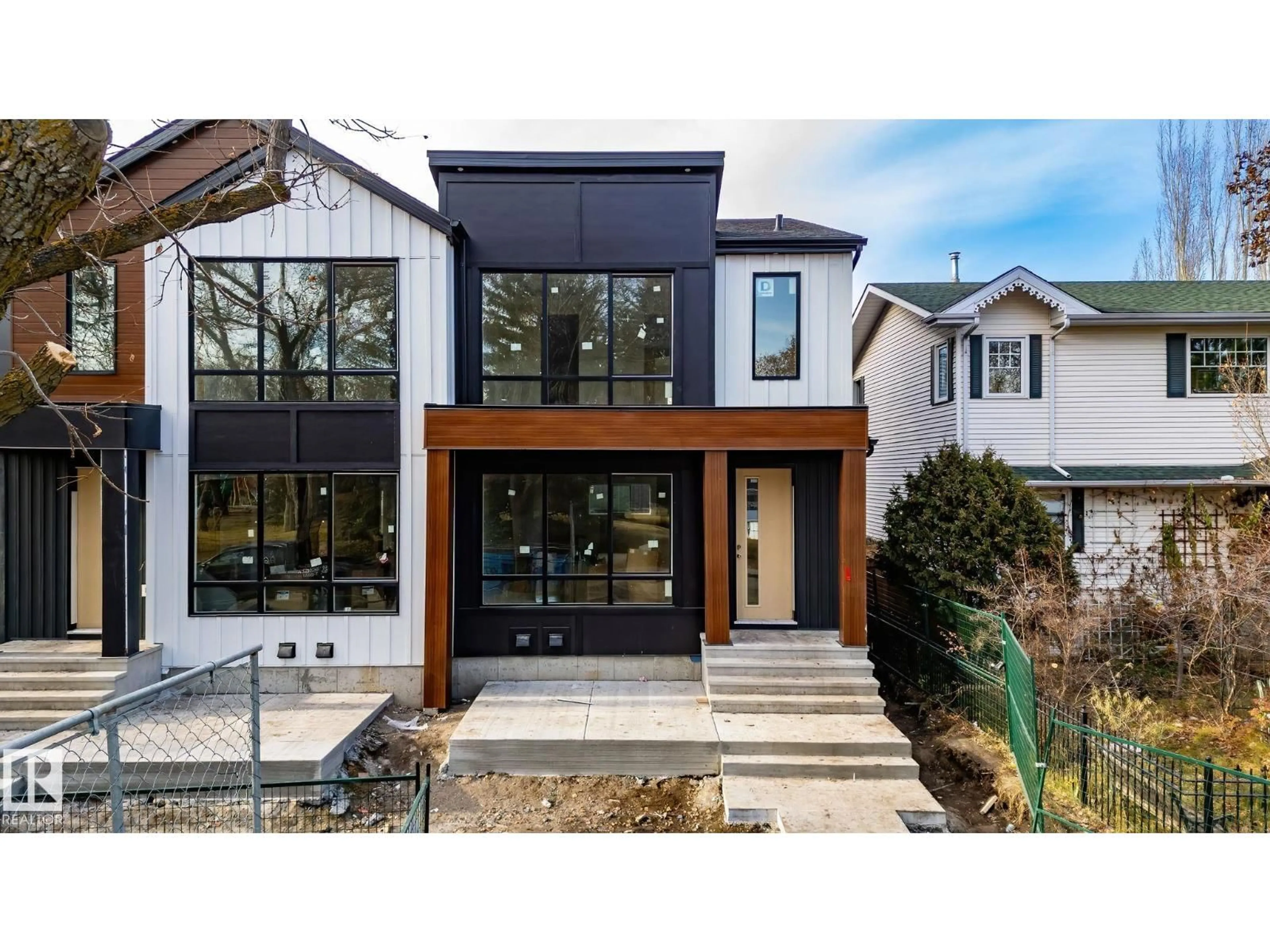 Home with brick exterior material, street for 9224 94 ST, Edmonton Alberta T6C3V5