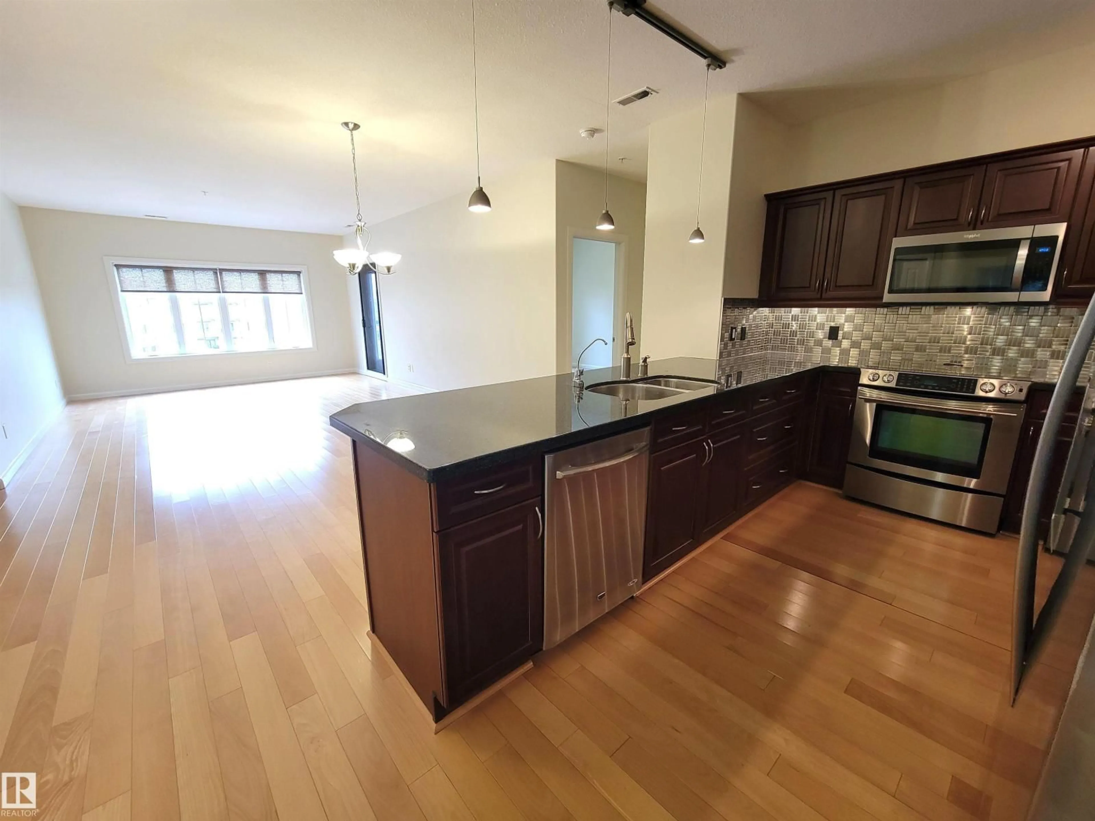 Open concept kitchen, unknown for 160 - 442 MAGRATH RD, Edmonton Alberta T6R3T7
