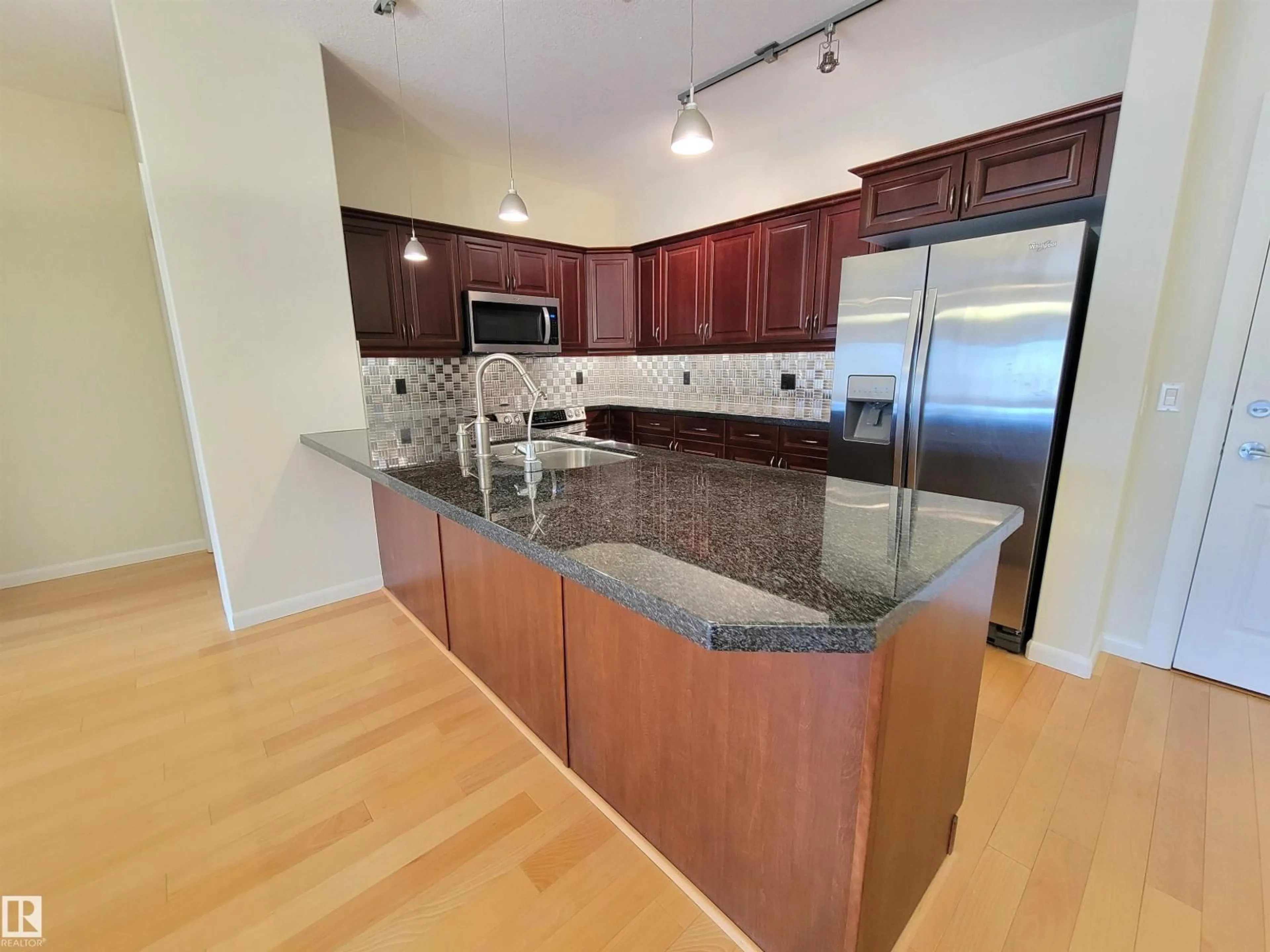 Open concept kitchen, unknown for 160 - 442 MAGRATH RD, Edmonton Alberta T6R3T7