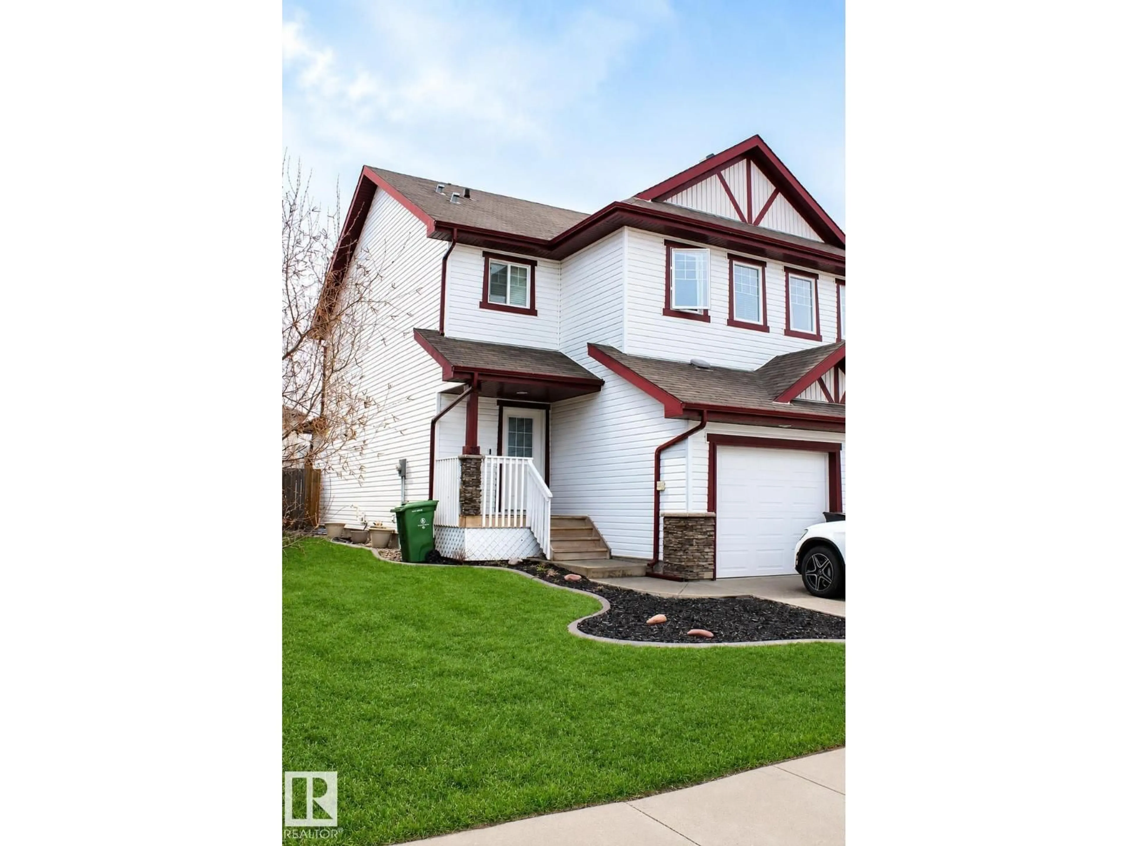 Home with vinyl exterior material, street for 39 CARAGANA WY, Fort Saskatchewan Alberta T8L0H4