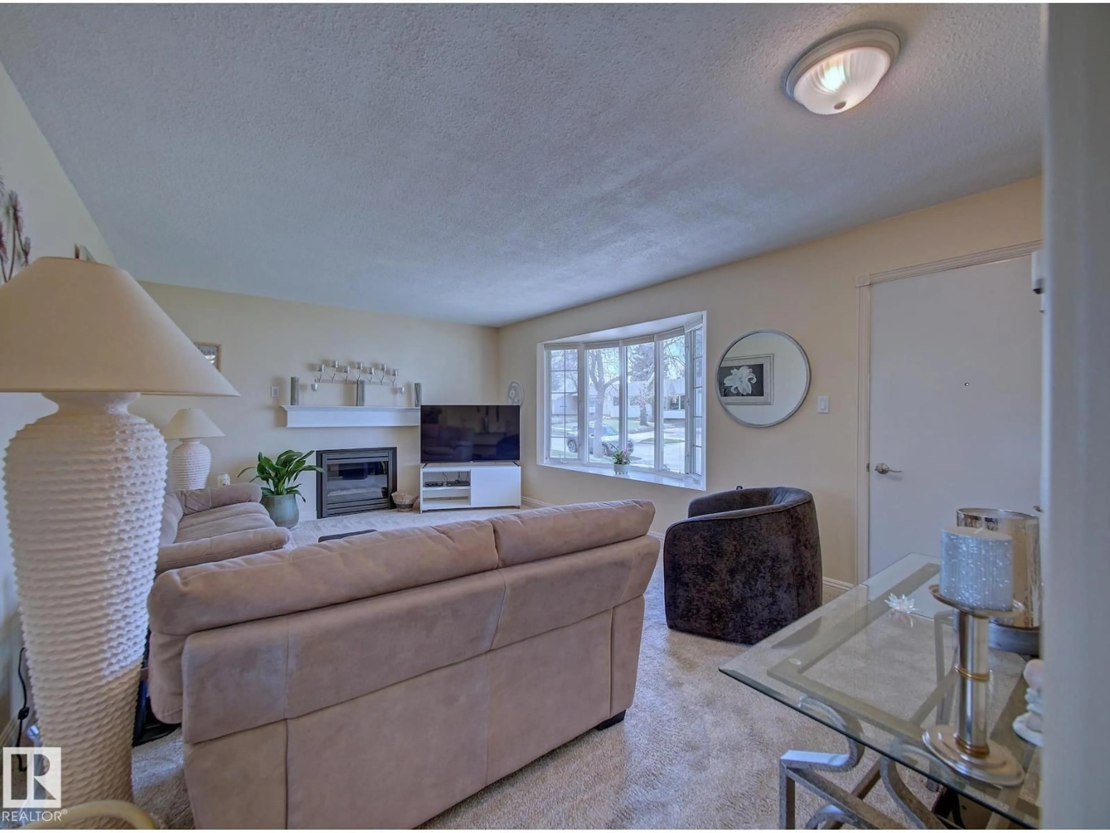 Living room with furniture, unknown for 8553 92 AV, Fort Saskatchewan Alberta T8L1A1