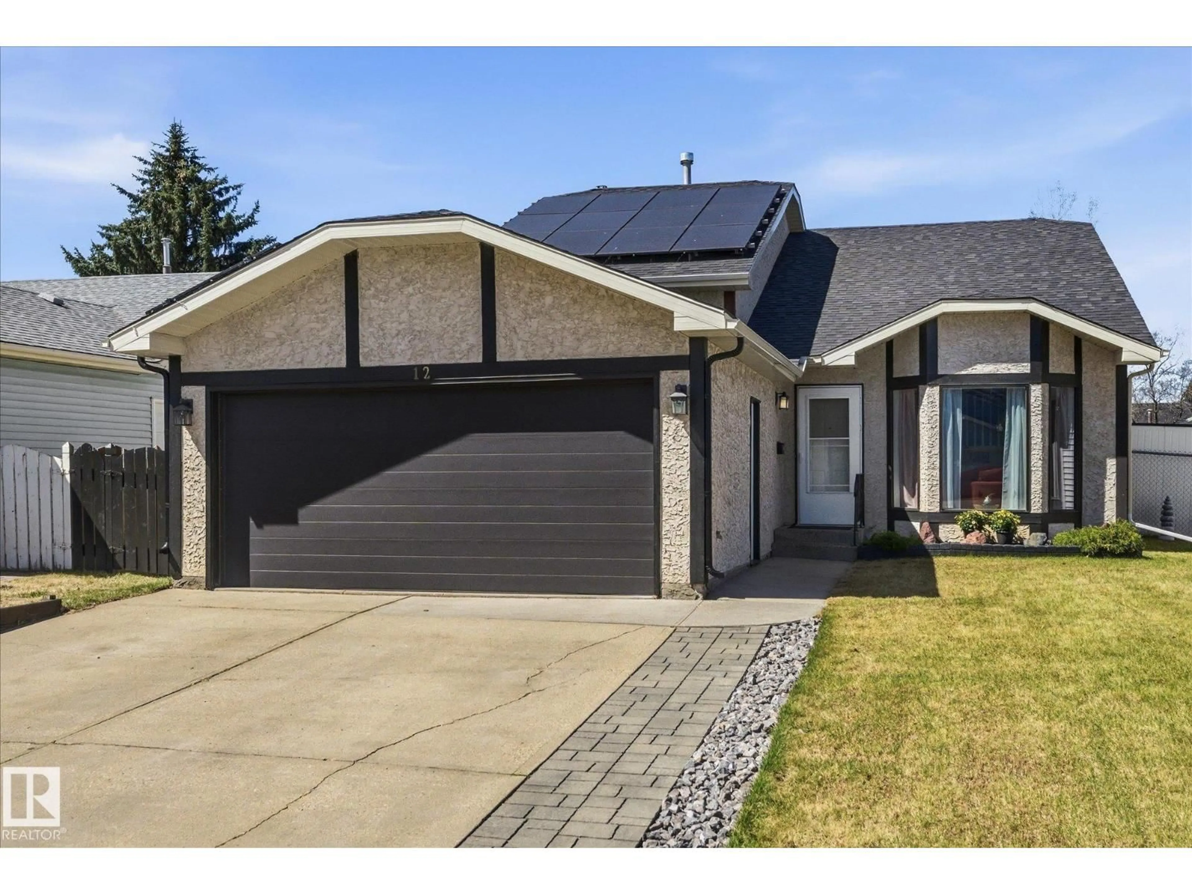 Home with brick exterior material, street for 12 MCKEAN WY, Spruce Grove Alberta T7X2R7