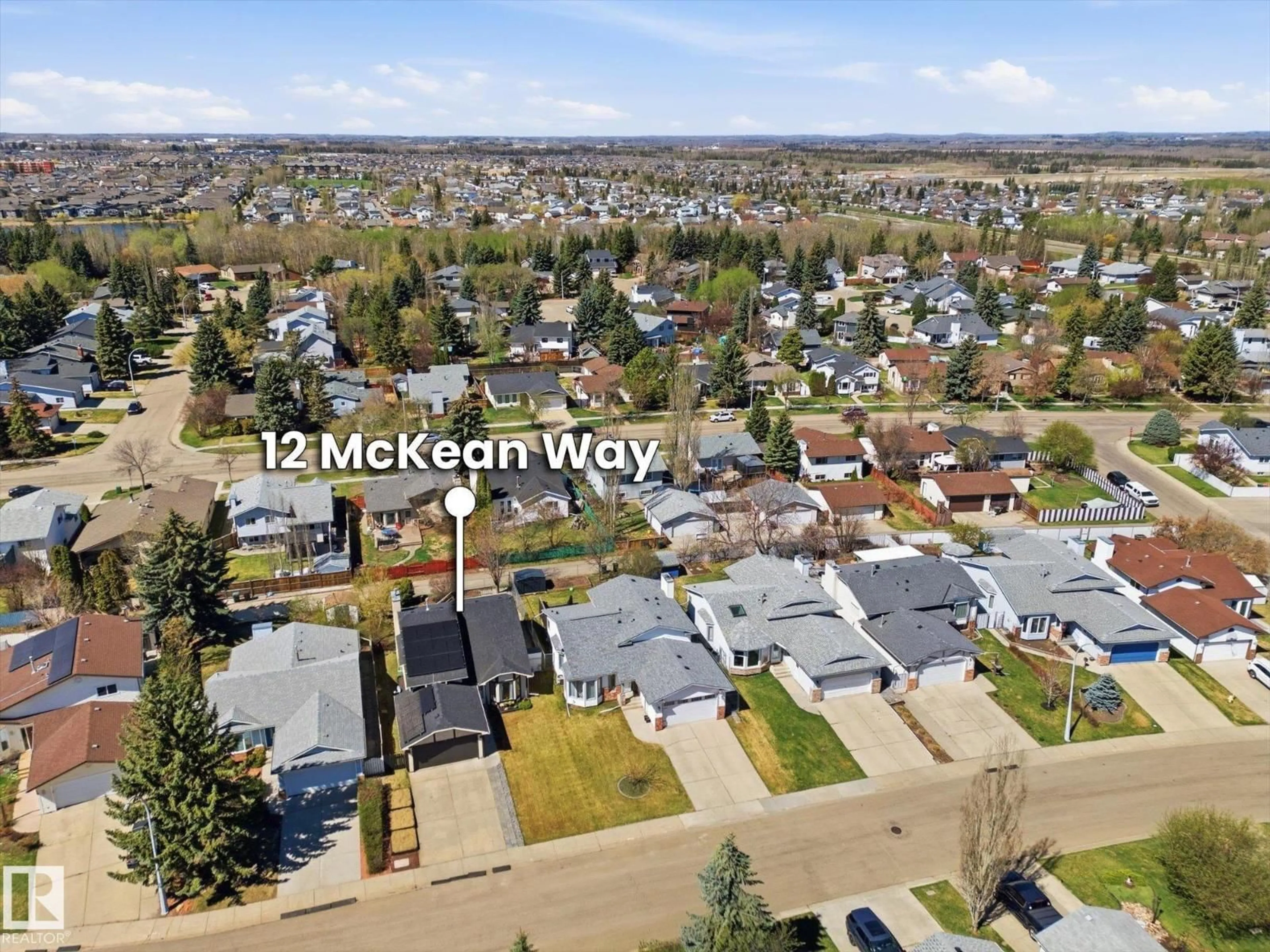 A pic from outside/outdoor area/front of a property/back of a property/a pic from drone, mountain view for 12 MCKEAN WY, Spruce Grove Alberta T7X2R7