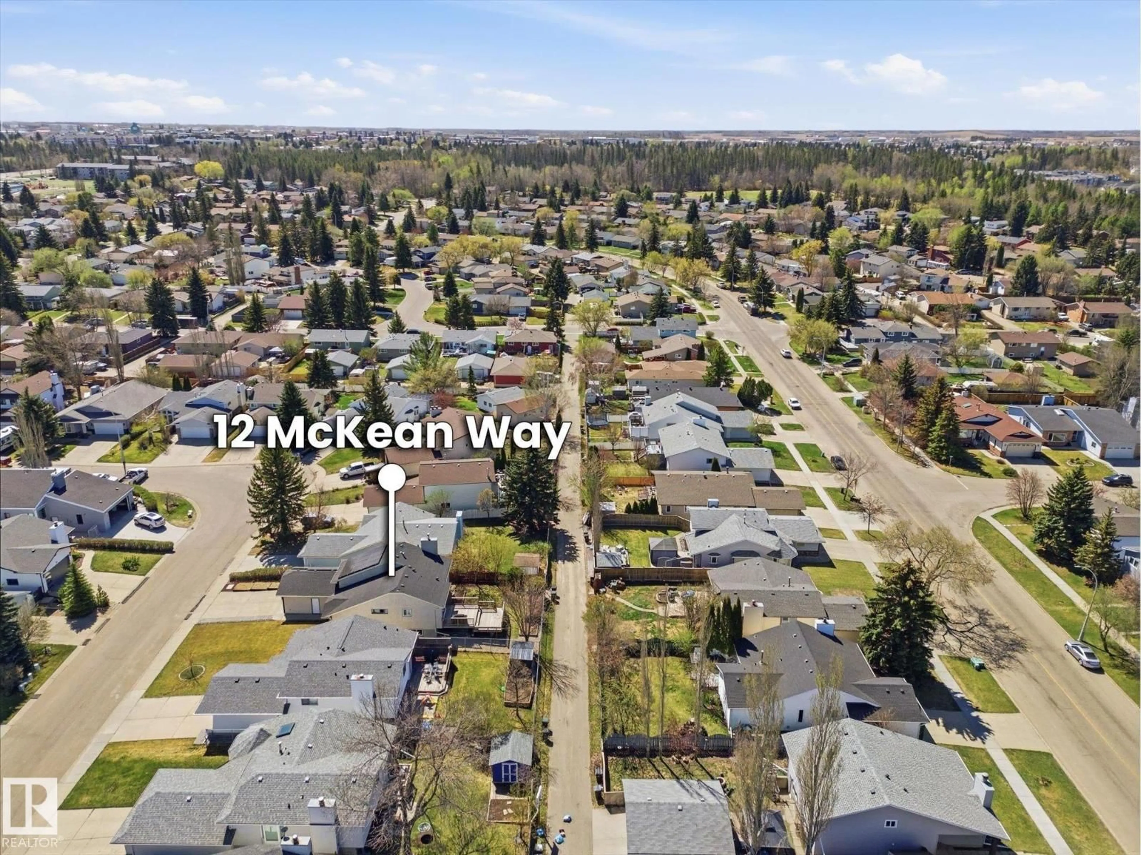 A pic from outside/outdoor area/front of a property/back of a property/a pic from drone, mountain view for 12 MCKEAN WY, Spruce Grove Alberta T7X2R7