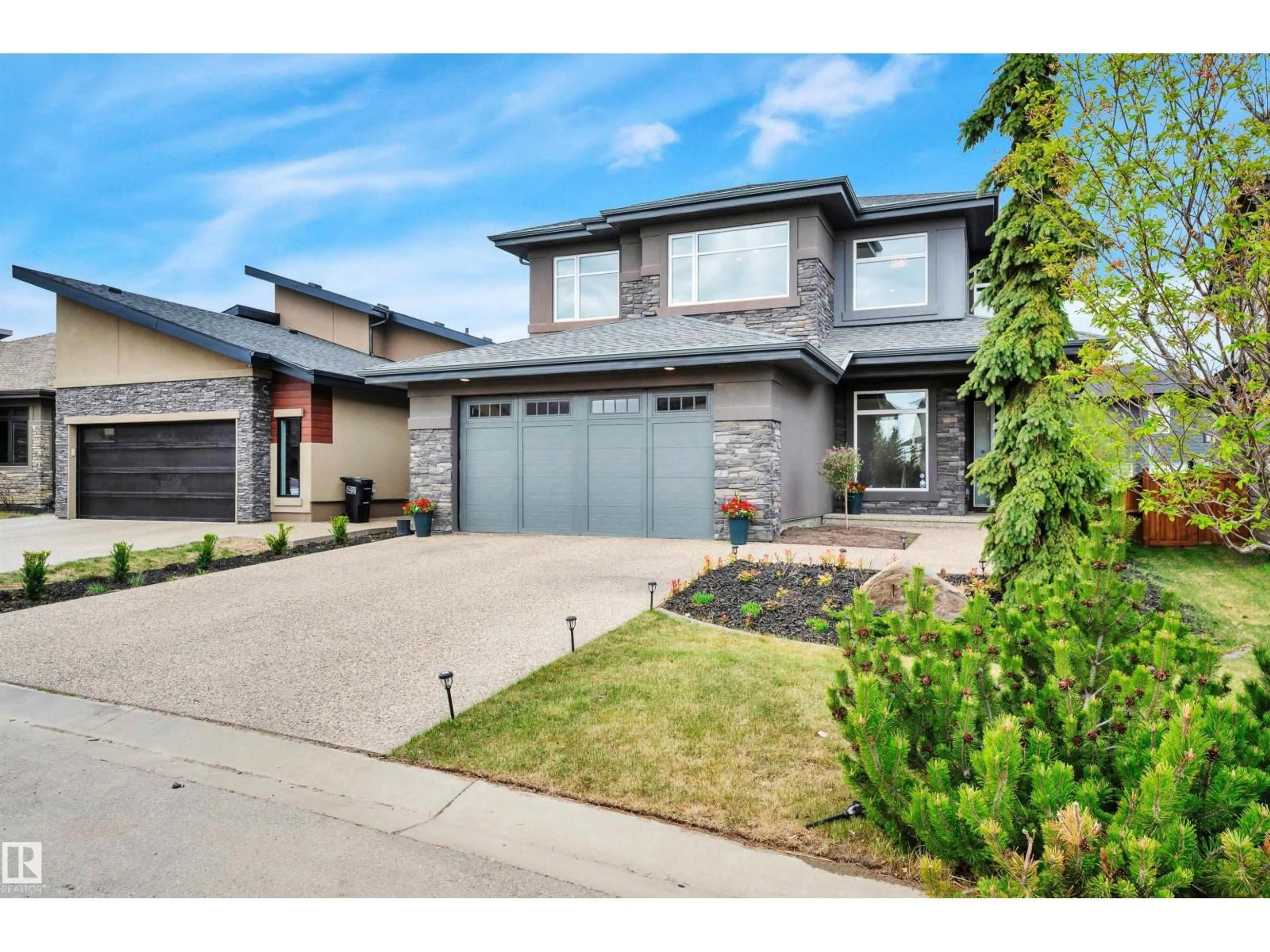 Home with brick exterior material, street for 1116 HAINSTOCK GREEN SW, Edmonton Alberta T6W2T8