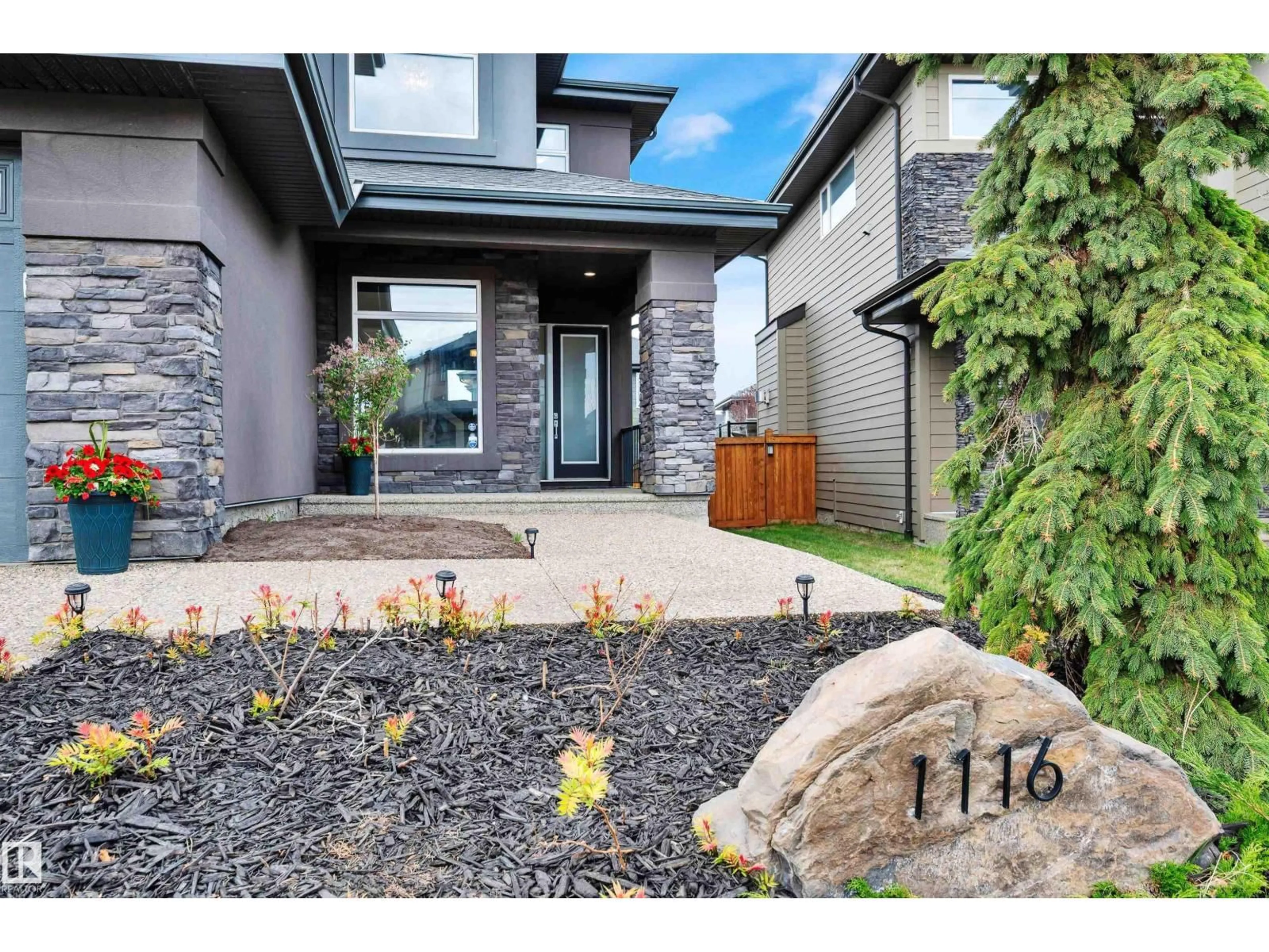 Home with brick exterior material, street for 1116 HAINSTOCK GREEN SW, Edmonton Alberta T6W2T8