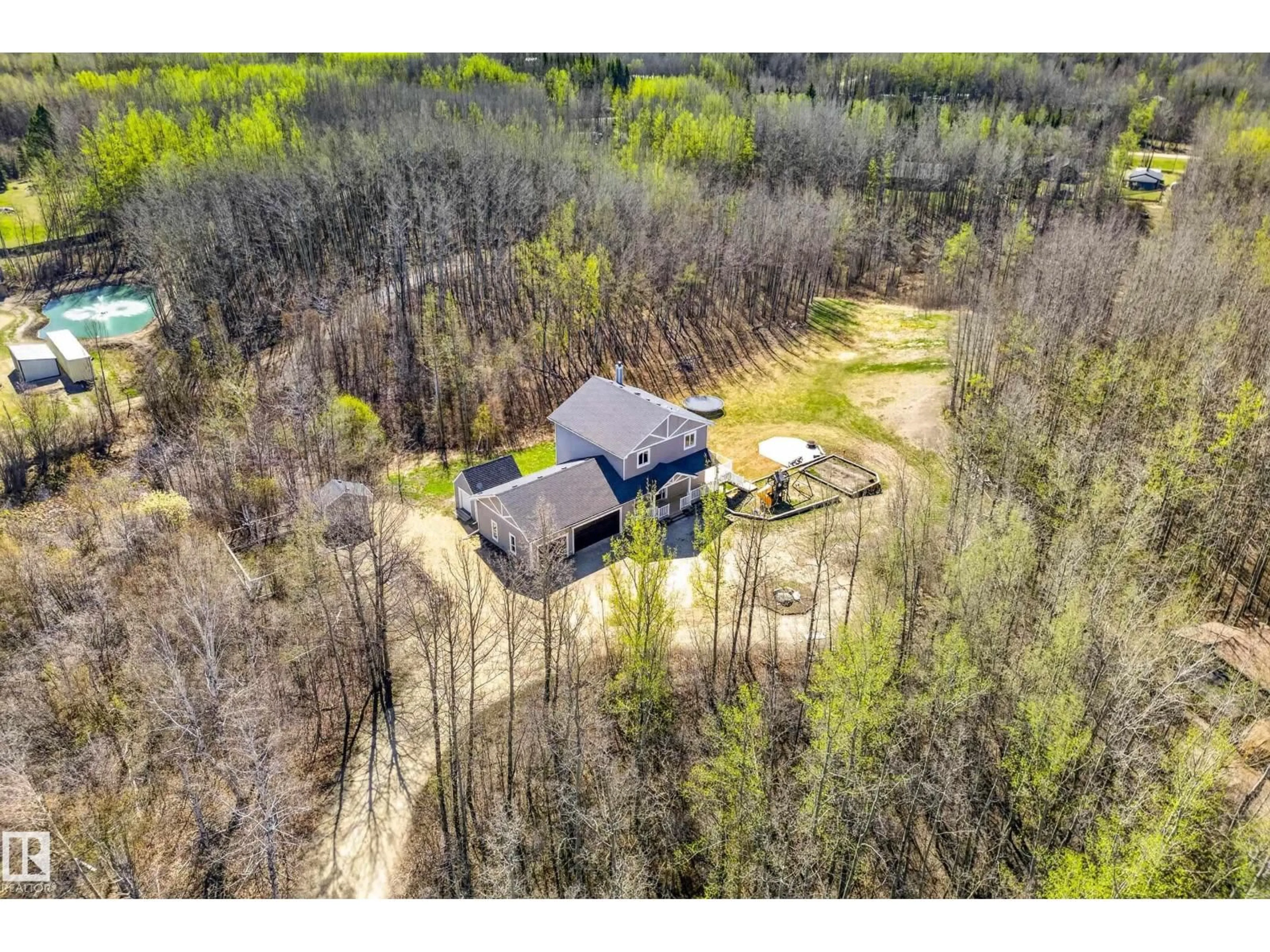 A pic from outside/outdoor area/front of a property/back of a property/a pic from drone, unknown for 53407 - 65 RGE ROAD 30, Rural Parkland County Alberta T7Y0E4