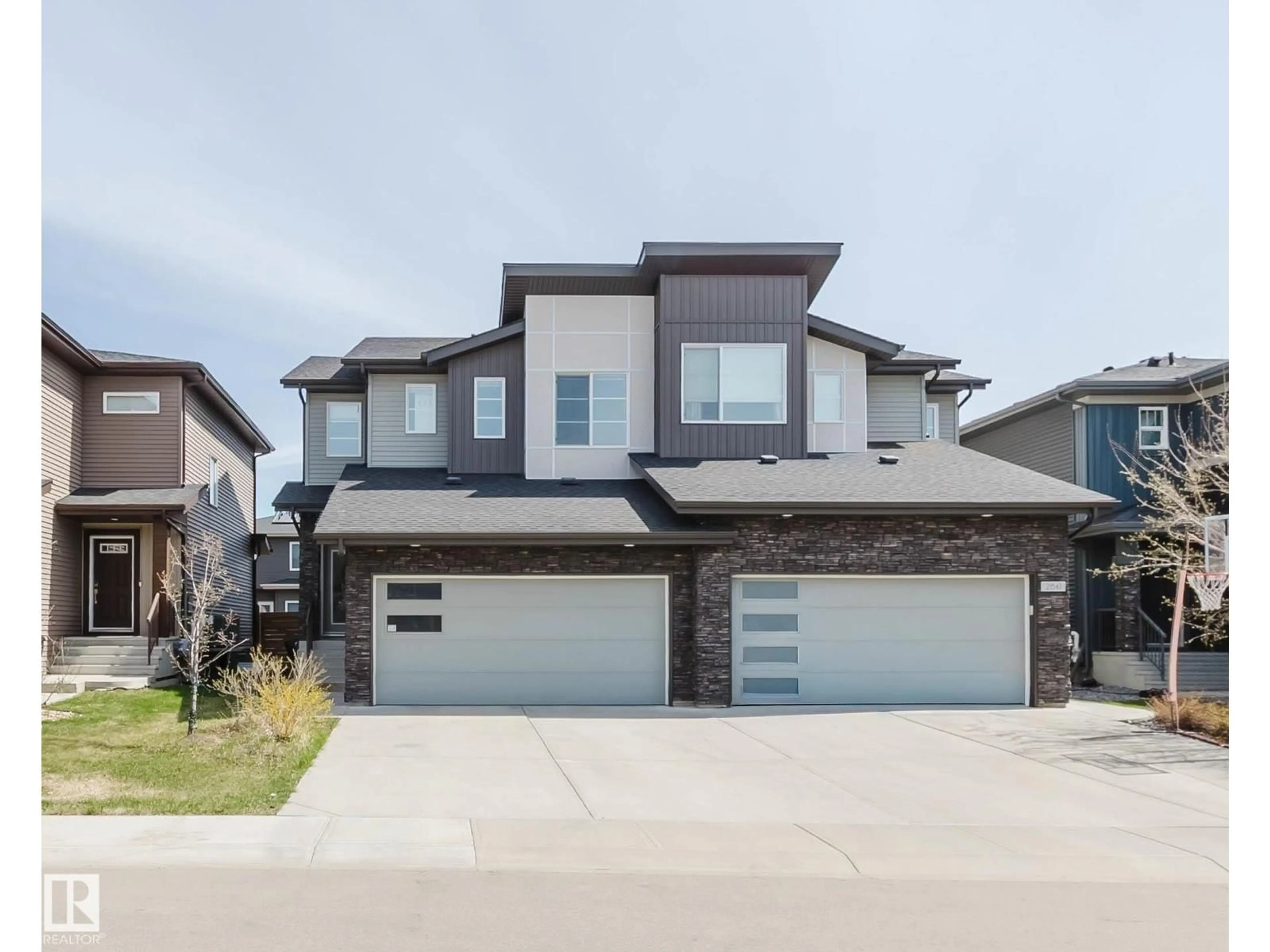 Home with brick exterior material, street for 2839 KOSHAL CR, Edmonton Alberta T6W3J7