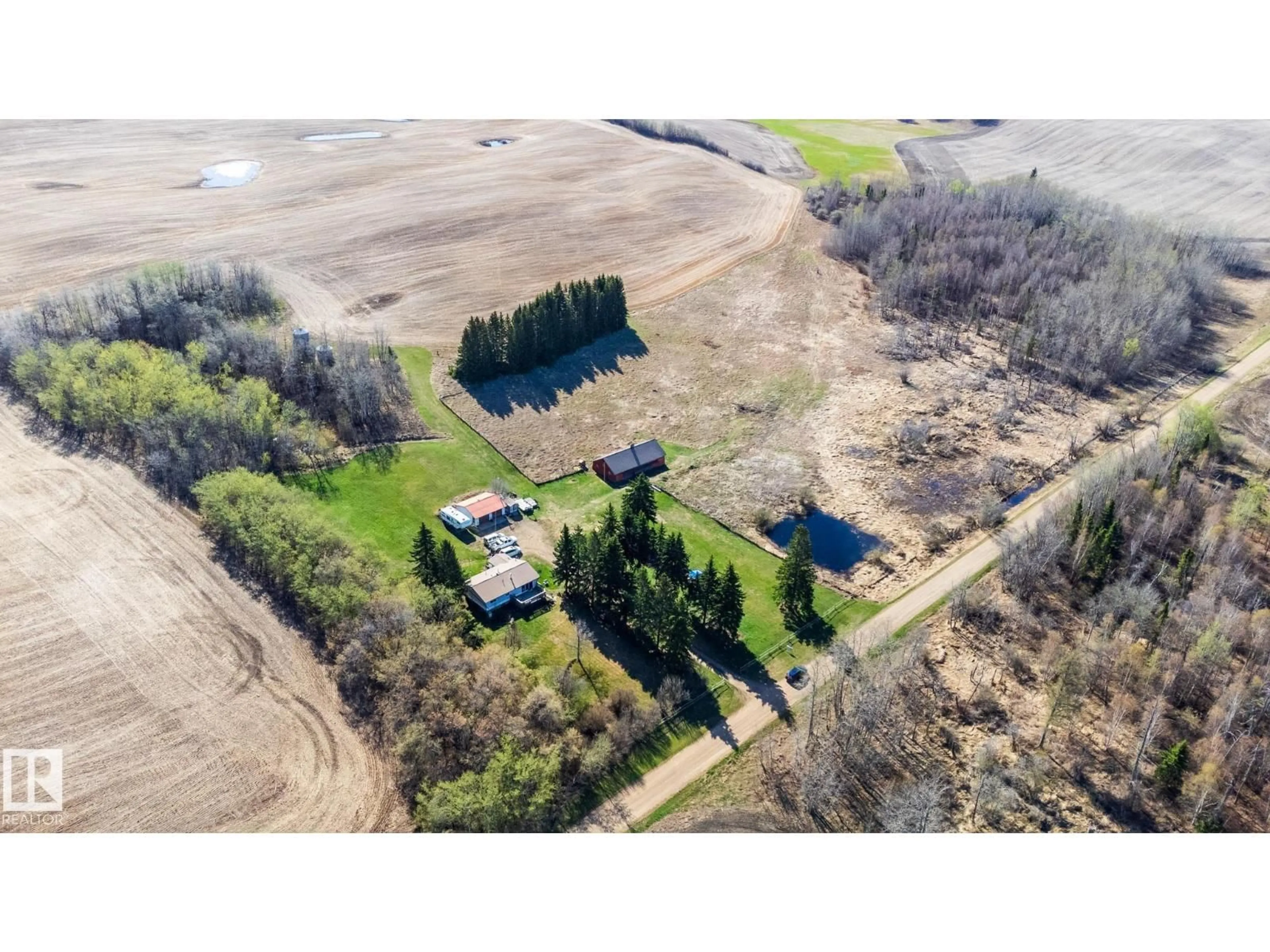 A pic from outside/outdoor area/front of a property/back of a property/a pic from drone, building for 58309 RGE ROAD 244, Rural Westlock County Alberta T0G1L0