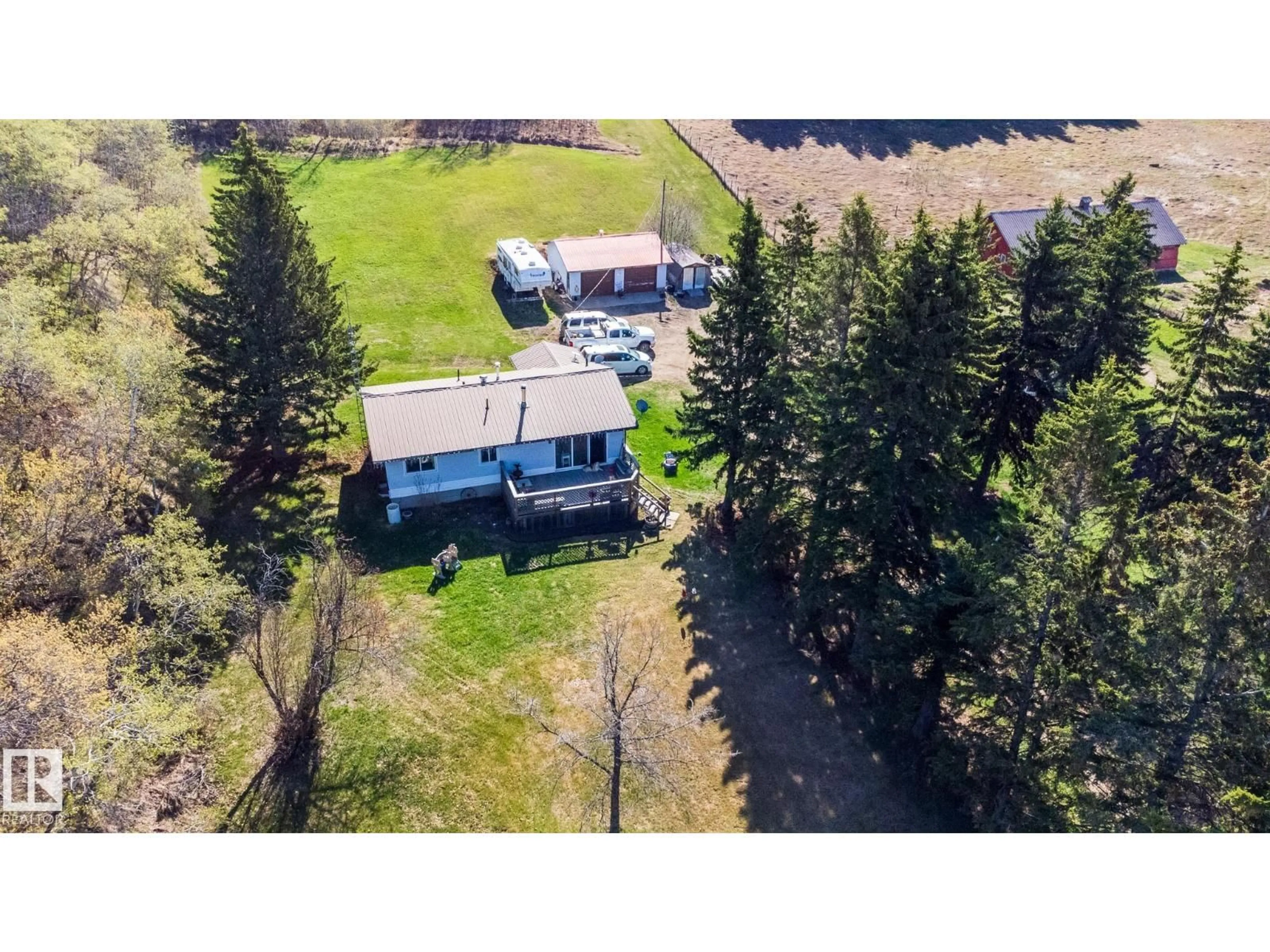 A pic from outside/outdoor area/front of a property/back of a property/a pic from drone, unknown for 58309 RGE ROAD 244, Rural Westlock County Alberta T0G1L0