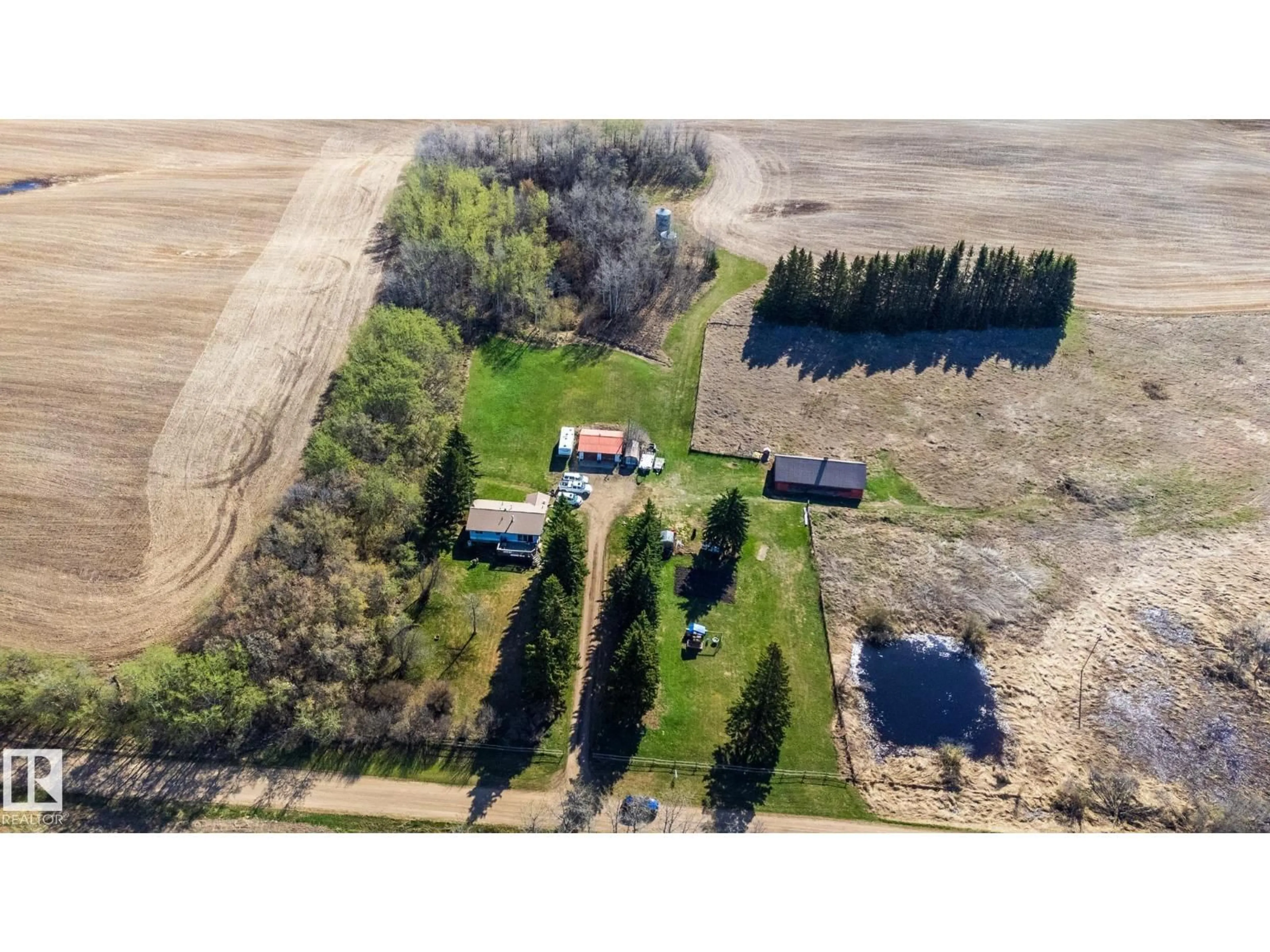 A pic from outside/outdoor area/front of a property/back of a property/a pic from drone, unknown for 58309 RGE ROAD 244, Rural Westlock County Alberta T0G1L0