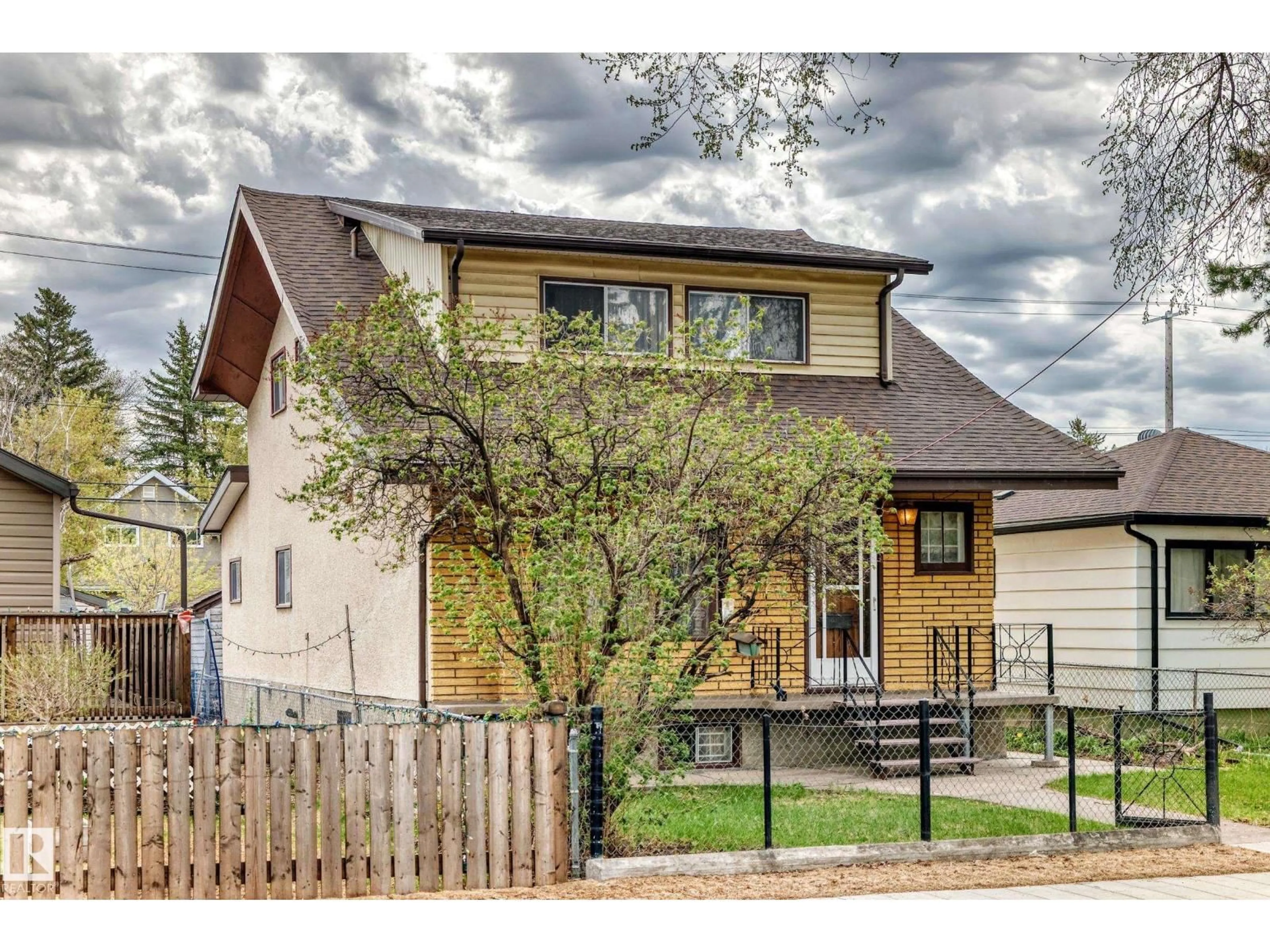 Home with brick exterior material, street for NW - 11929 91 ST, Edmonton Alberta T5B4B7