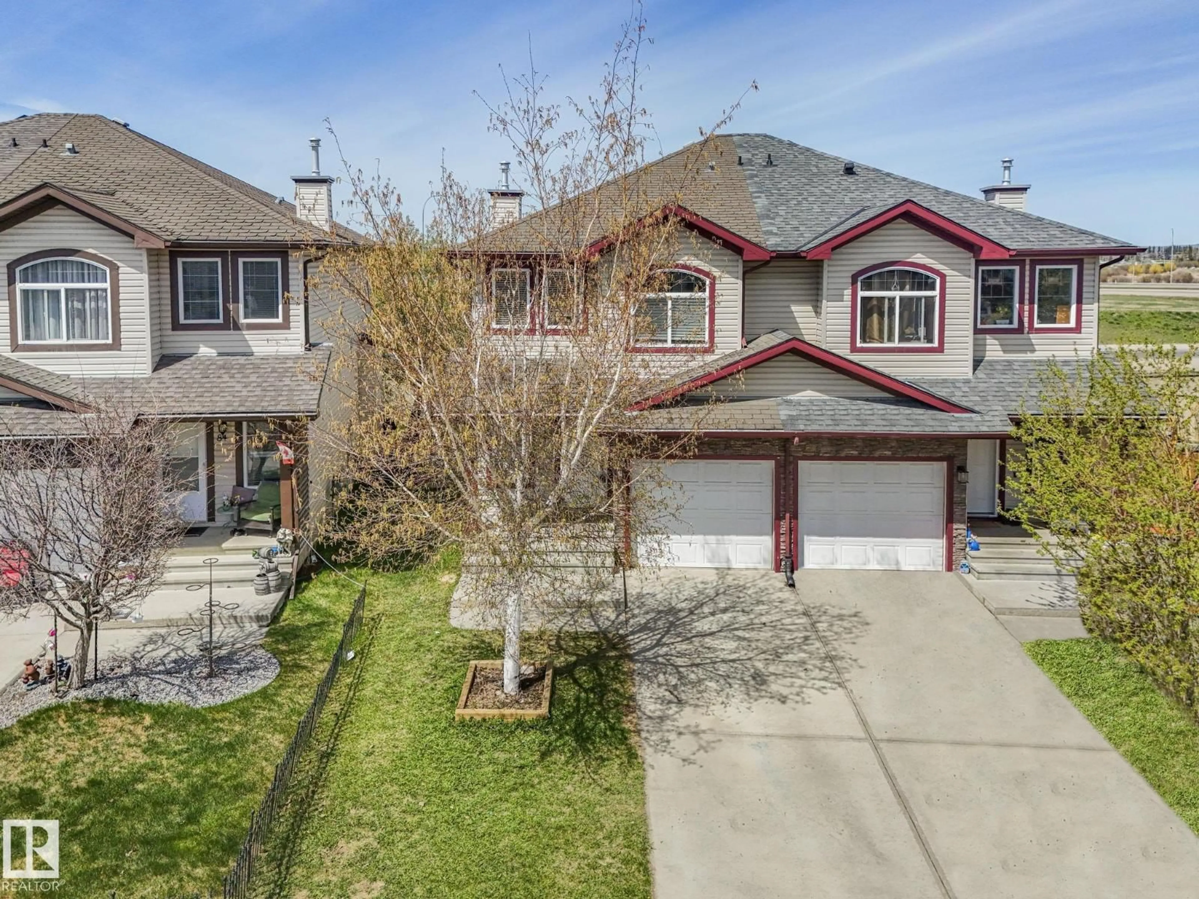 A pic from outside/outdoor area/front of a property/back of a property/a pic from drone, street for 86 MERIDIAN LOOP, Stony Plain Alberta T7Z0B9
