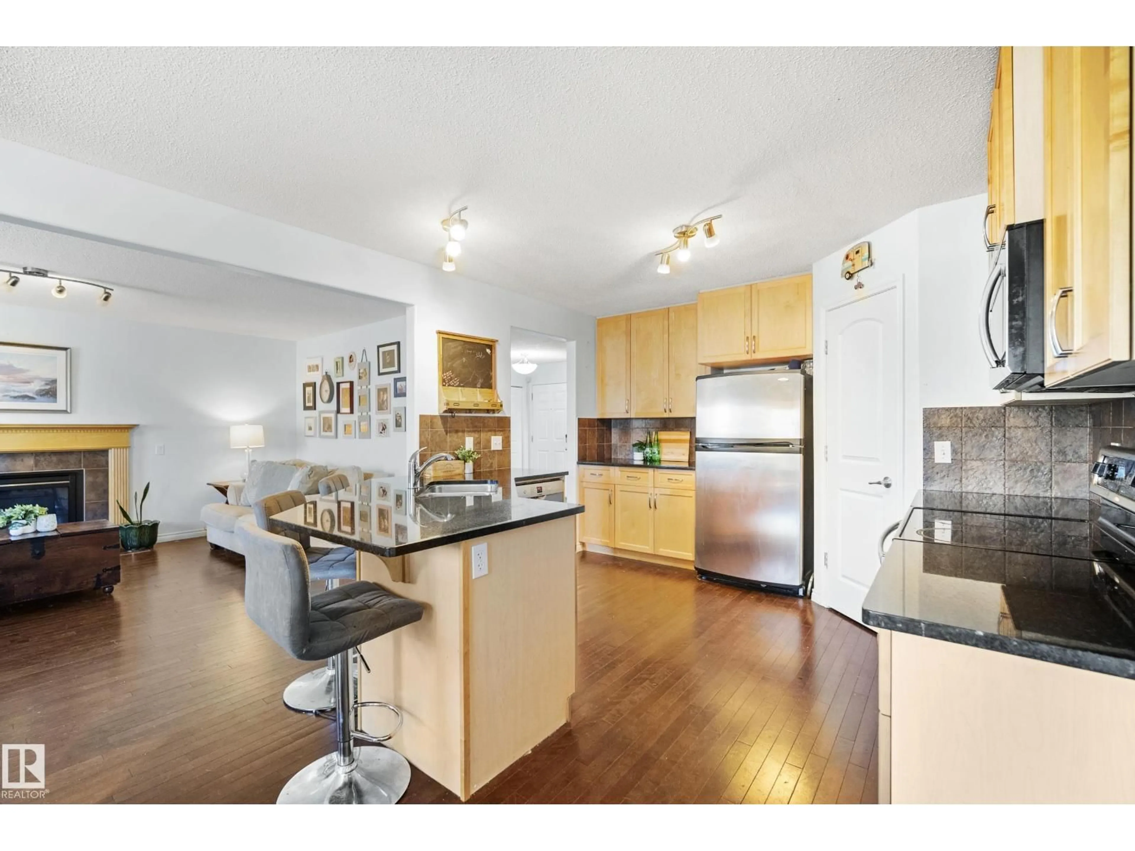 Open concept kitchen, unknown for NW - 1212 37C AV, Edmonton Alberta T6T0E5