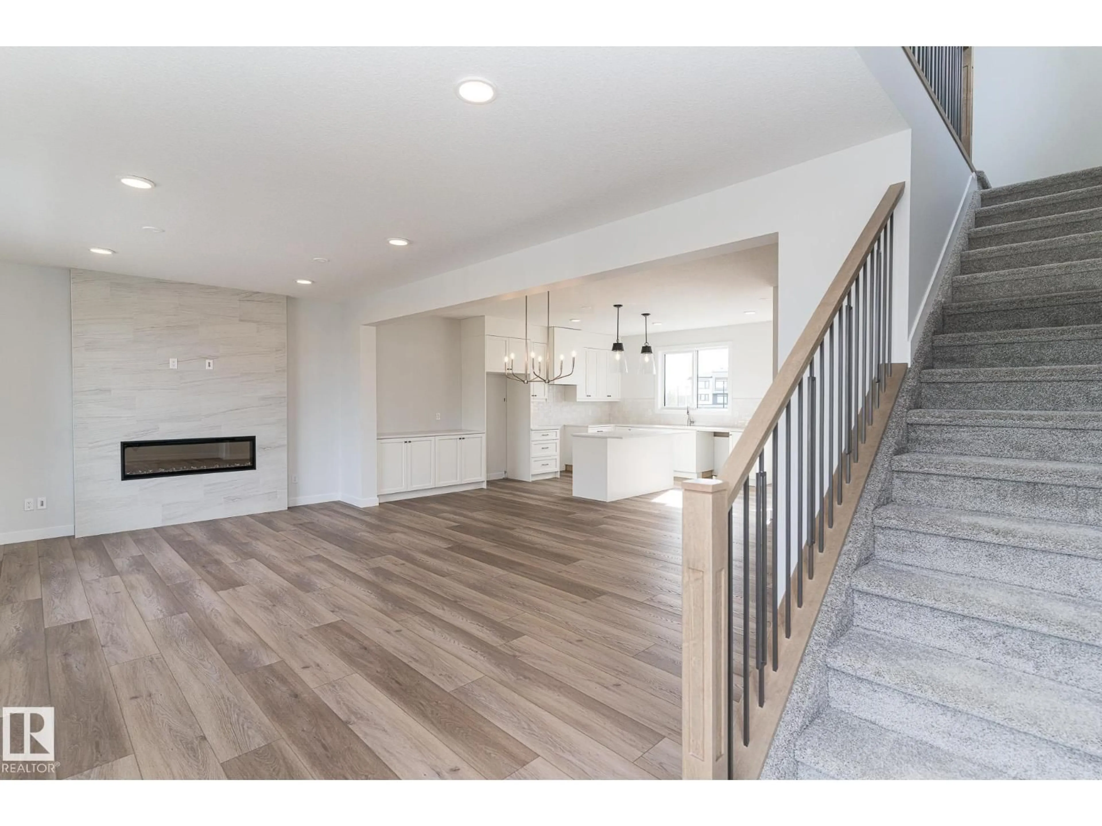 Open concept kitchen, wood/laminate floor for 7135 MAY CR, Edmonton Alberta T6R0V9