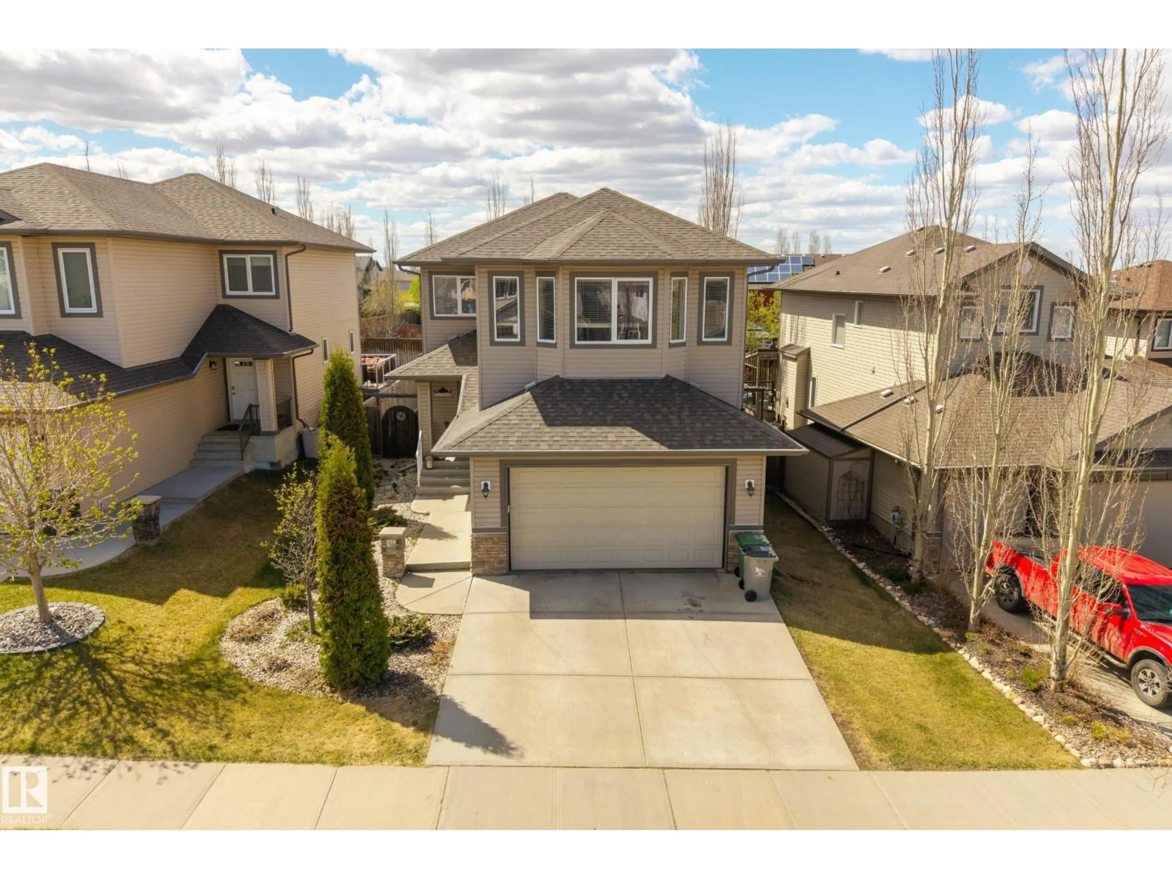 A pic from outside/outdoor area/front of a property/back of a property/a pic from drone, street for 5708 42 ST, Beaumont Alberta T4R0C2