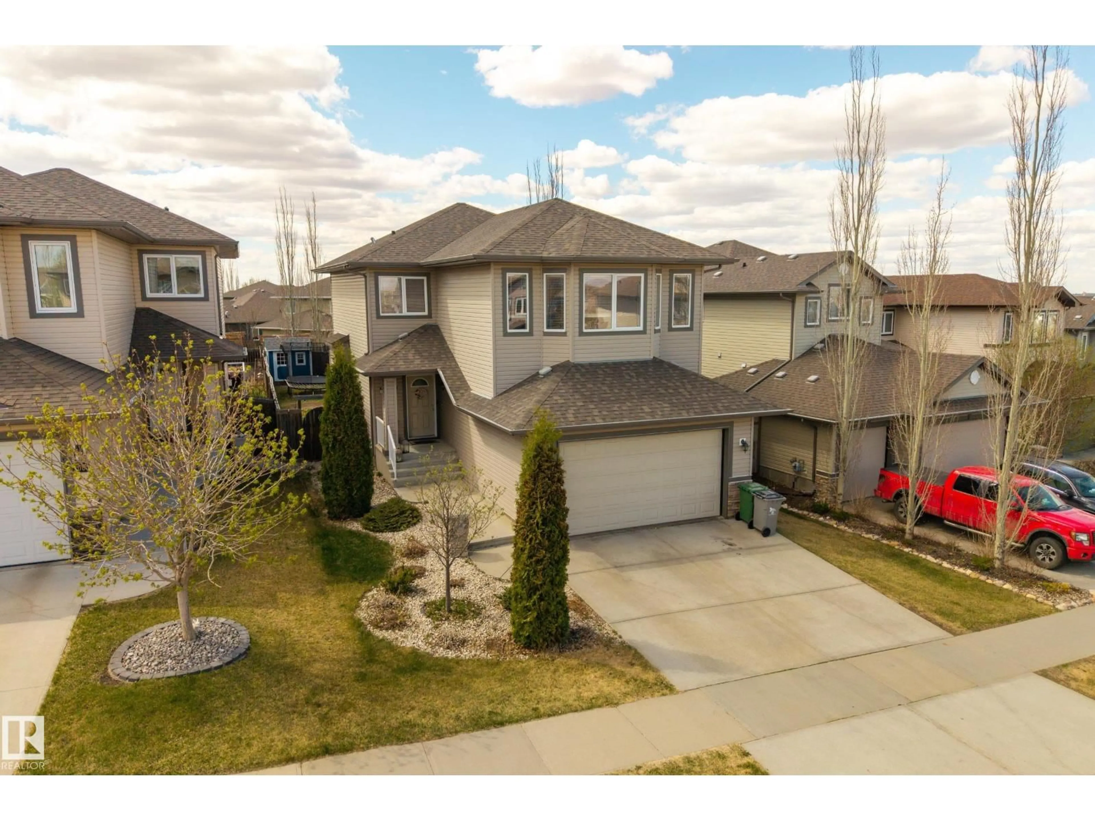 A pic from outside/outdoor area/front of a property/back of a property/a pic from drone, street for 5708 42 ST, Beaumont Alberta T4R0C2
