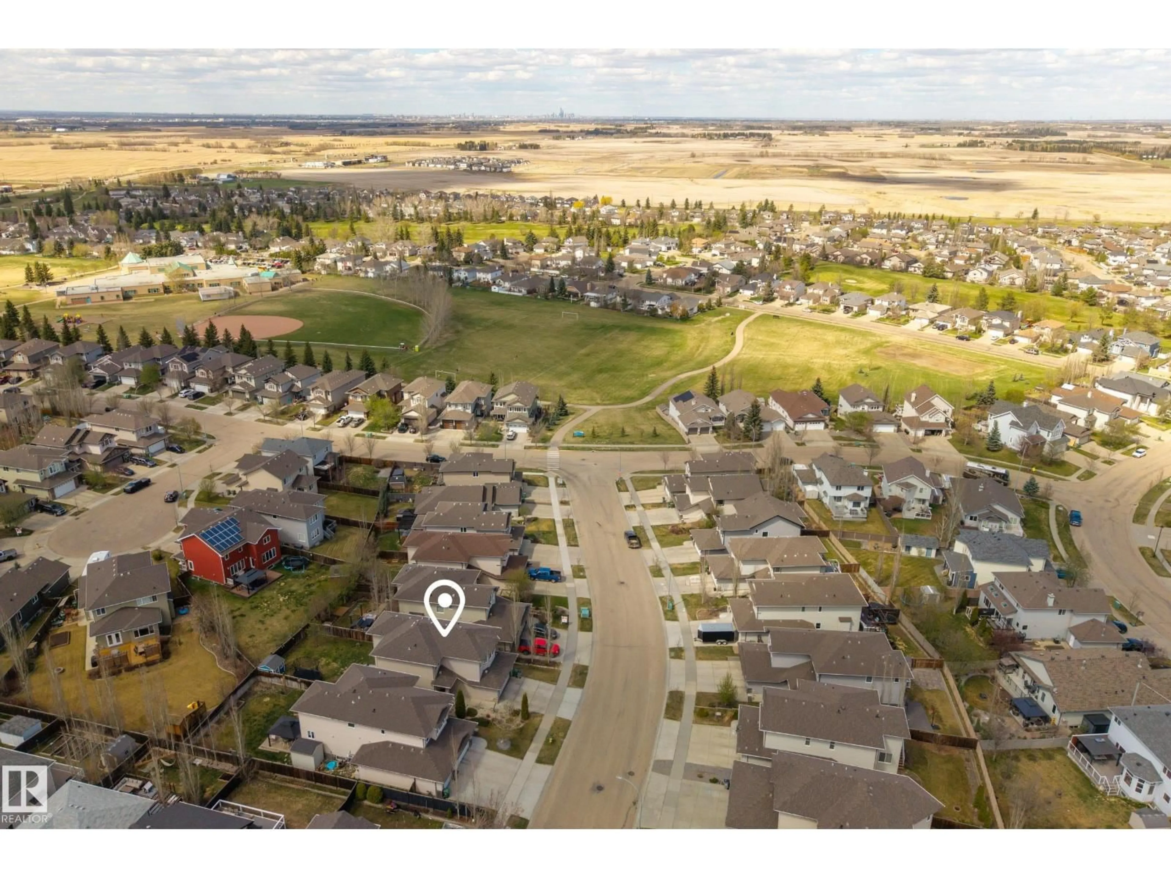 A pic from outside/outdoor area/front of a property/back of a property/a pic from drone, street for 5708 42 ST, Beaumont Alberta T4R0C2