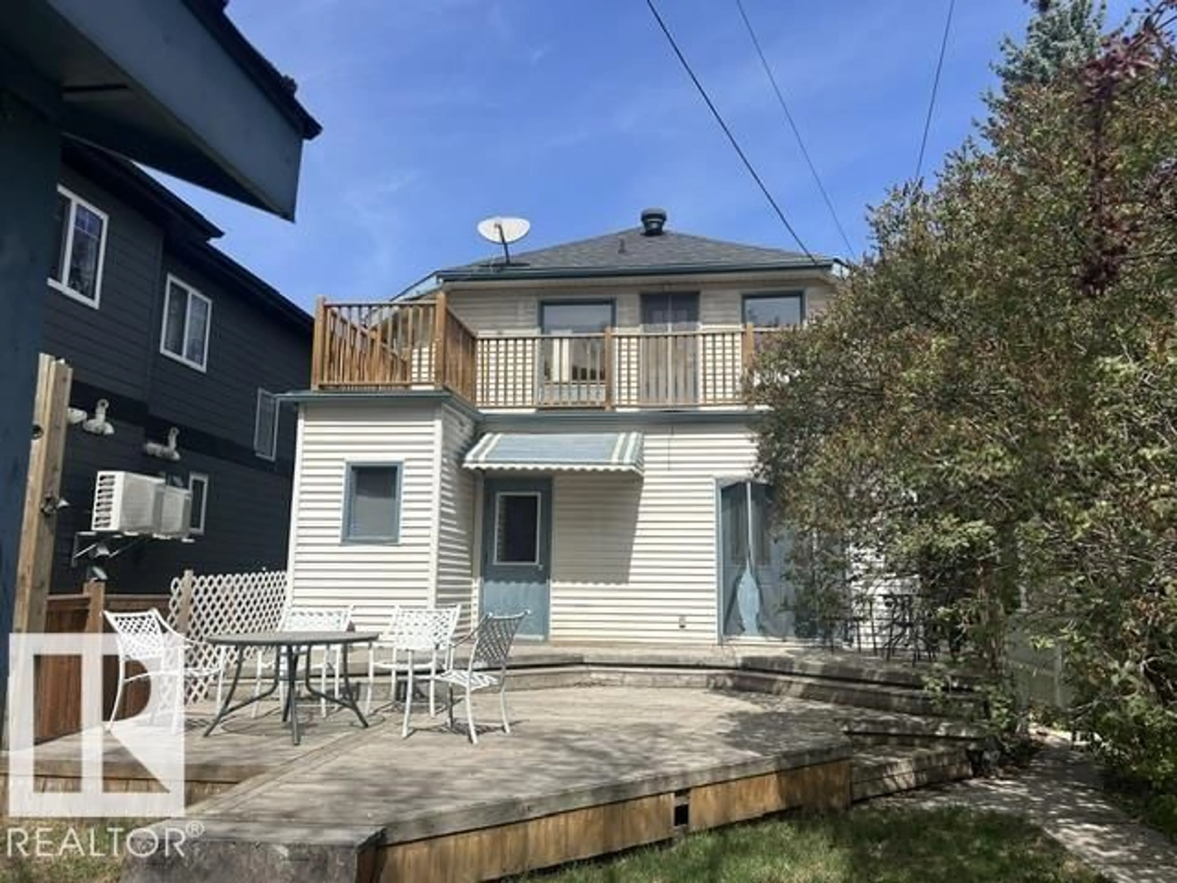 A pic from outside/outdoor area/front of a property/back of a property/a pic from drone, street for 10841 80 AV, Edmonton Alberta T6E1V9