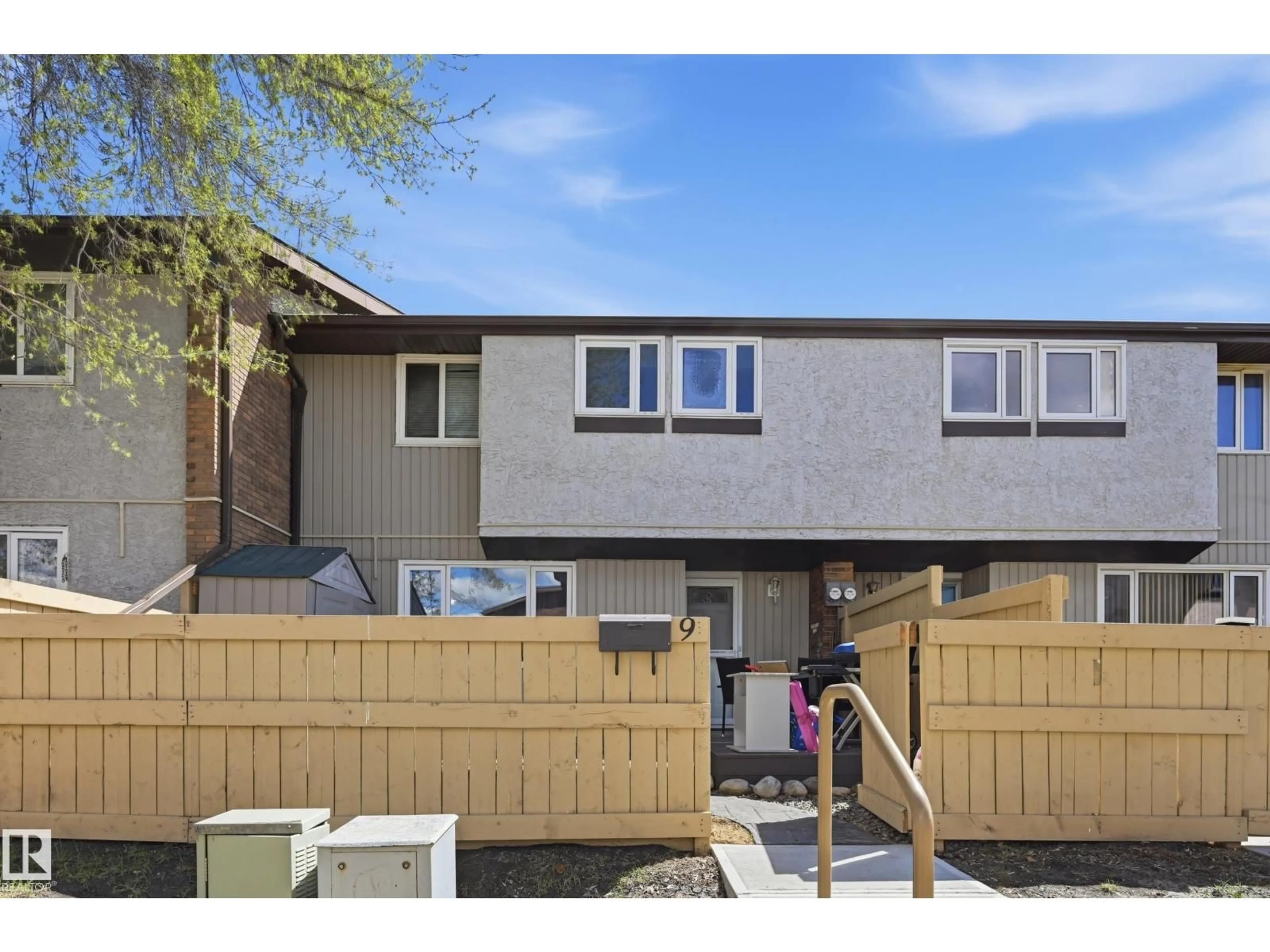 Home with vinyl exterior material, street for #9 - 8020 141 AV NW, Edmonton Alberta T5C2N9