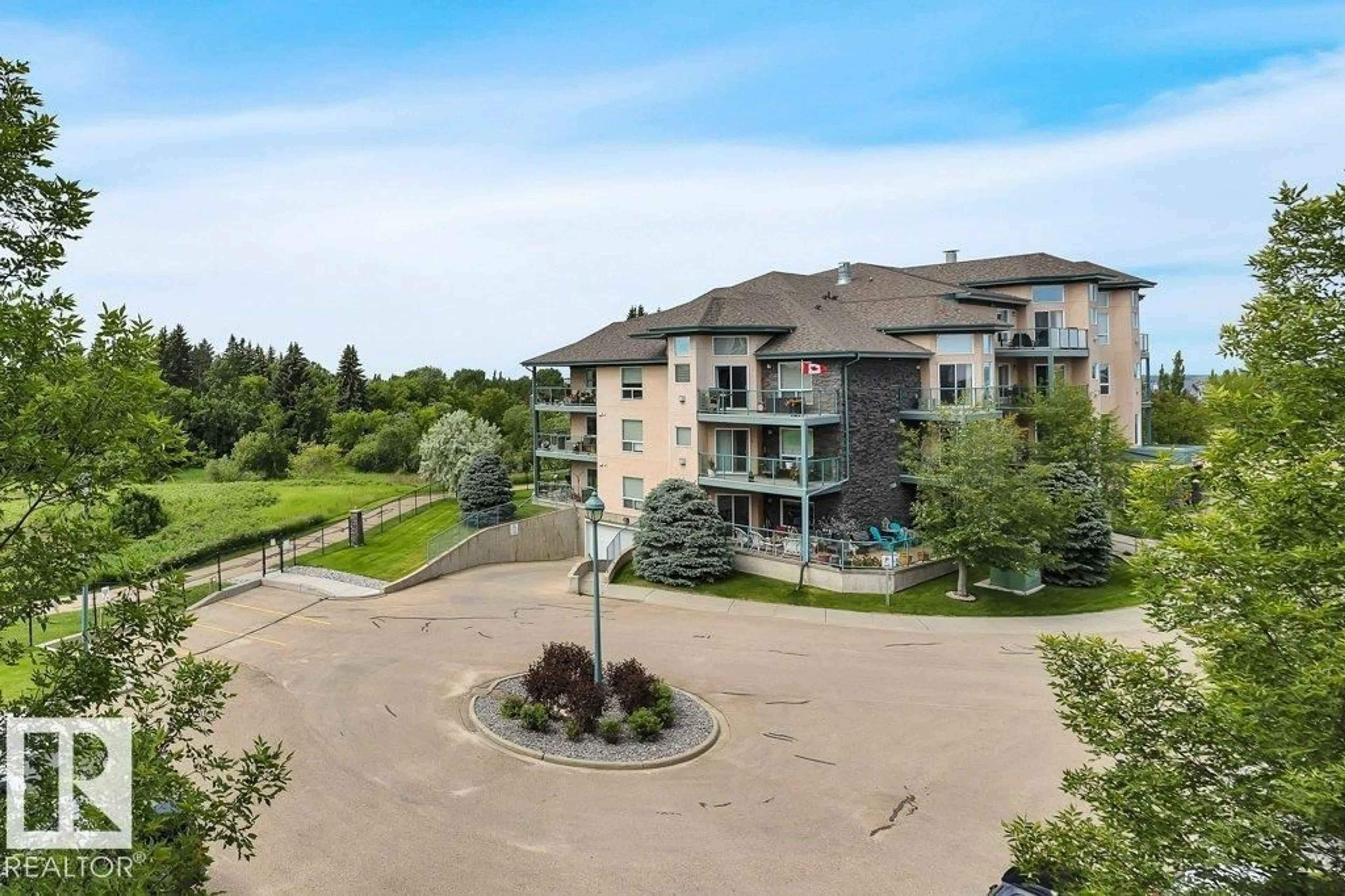 A pic from outside/outdoor area/front of a property/back of a property/a pic from drone, water/lake/river/ocean view for #302 - 102A BRIDGEPORT CX, Leduc Alberta T9E8K8