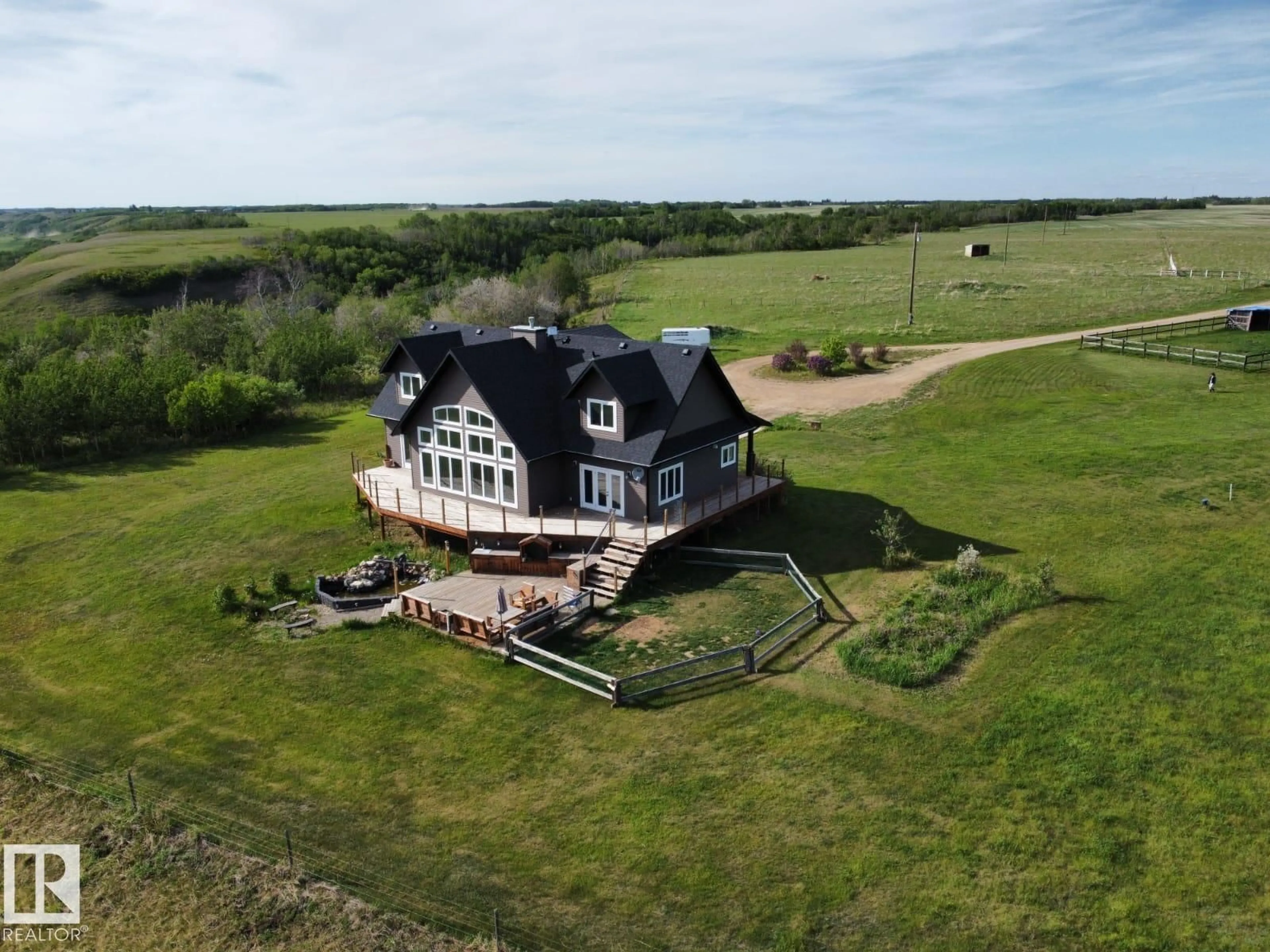 A pic from outside/outdoor area/front of a property/back of a property/a pic from drone, building for 20213 TOWNSHIP ROAD 460, Rural Camrose County Alberta T4V2M9