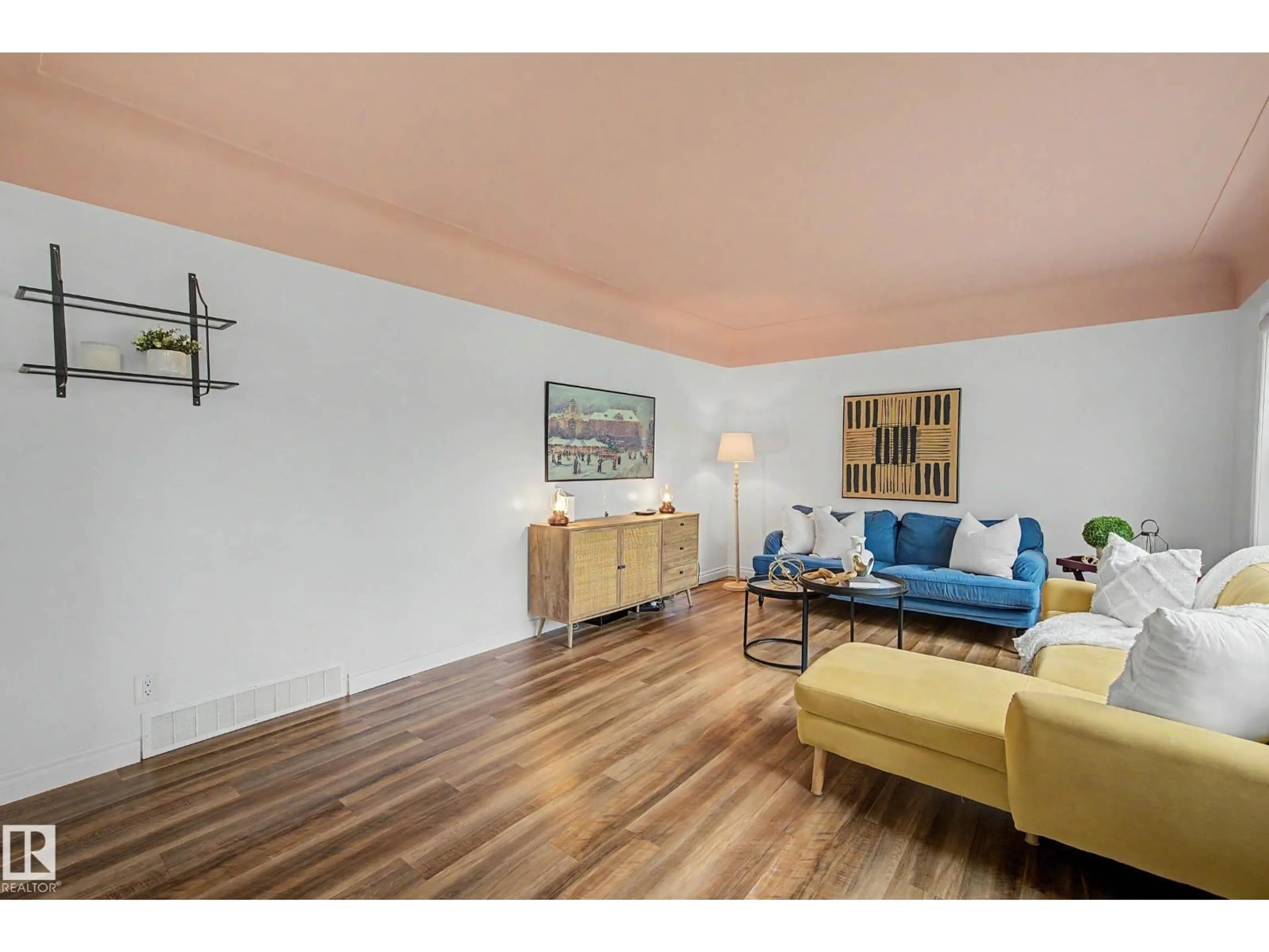 Living room with furniture, wood/laminate floor for 13316 109A AV AV, Edmonton Alberta T5M2J6