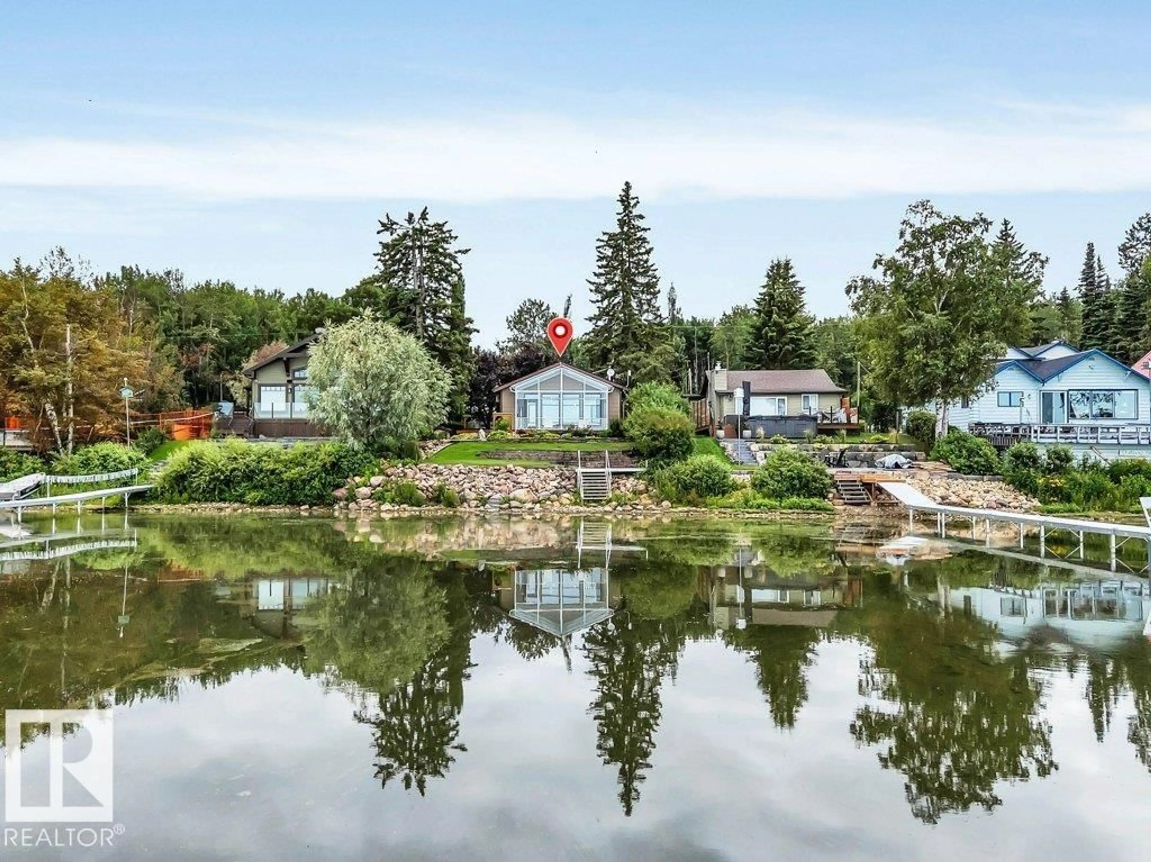 A pic from outside/outdoor area/front of a property/back of a property/a pic from drone, water/lake/river/ocean view for 118 CRYSTAL SPRINGS DRIVE, Rural Wetaskiwin County Alberta T0C2V0