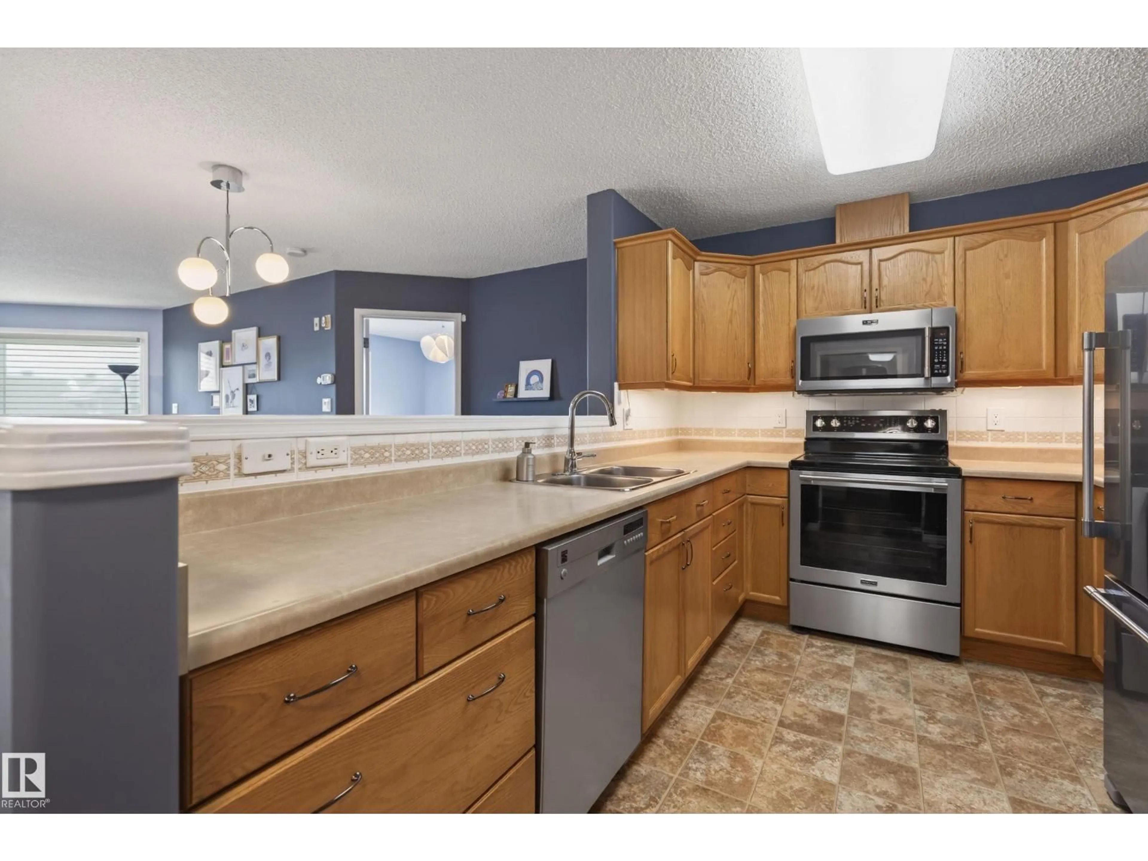 Open concept kitchen, unknown for #406 - 7839 96 ST, Edmonton Alberta T6C4R4