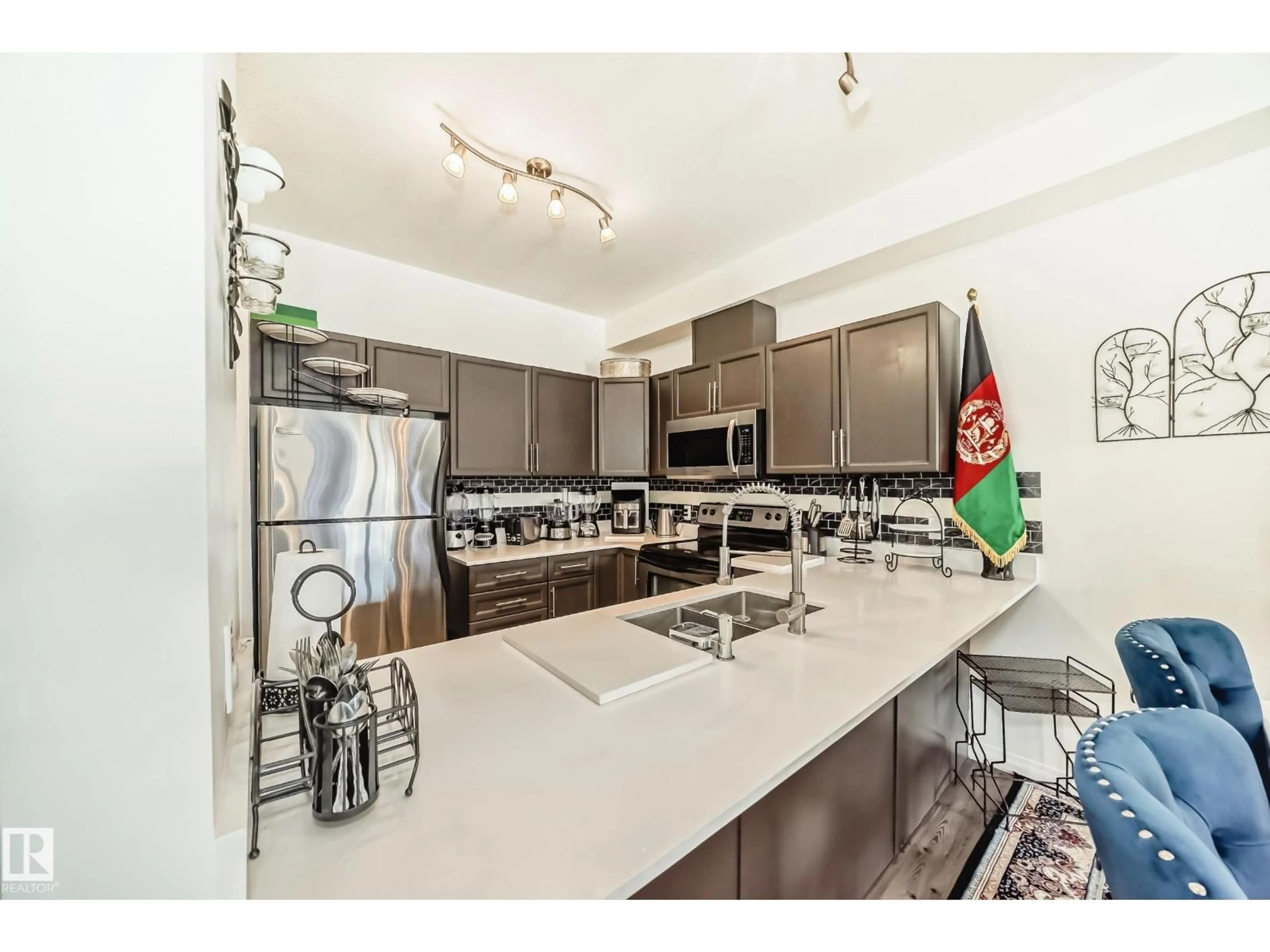 Open concept kitchen, unknown for 207 - 4316 139 AV, Edmonton Alberta T5Y0L1