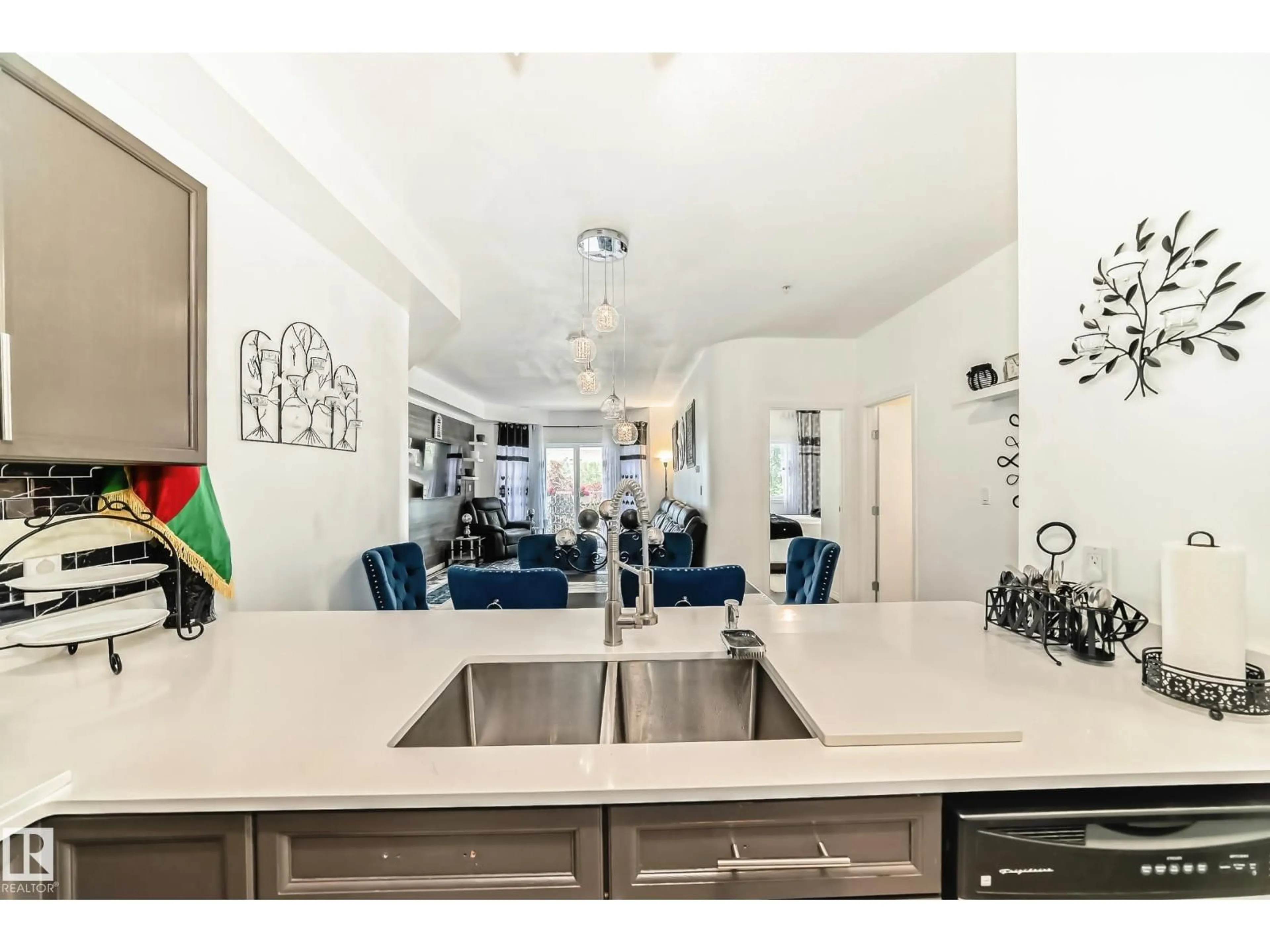 Open concept kitchen, ceramic/tile floor for 207 - 4316 139 AV, Edmonton Alberta T5Y0L1