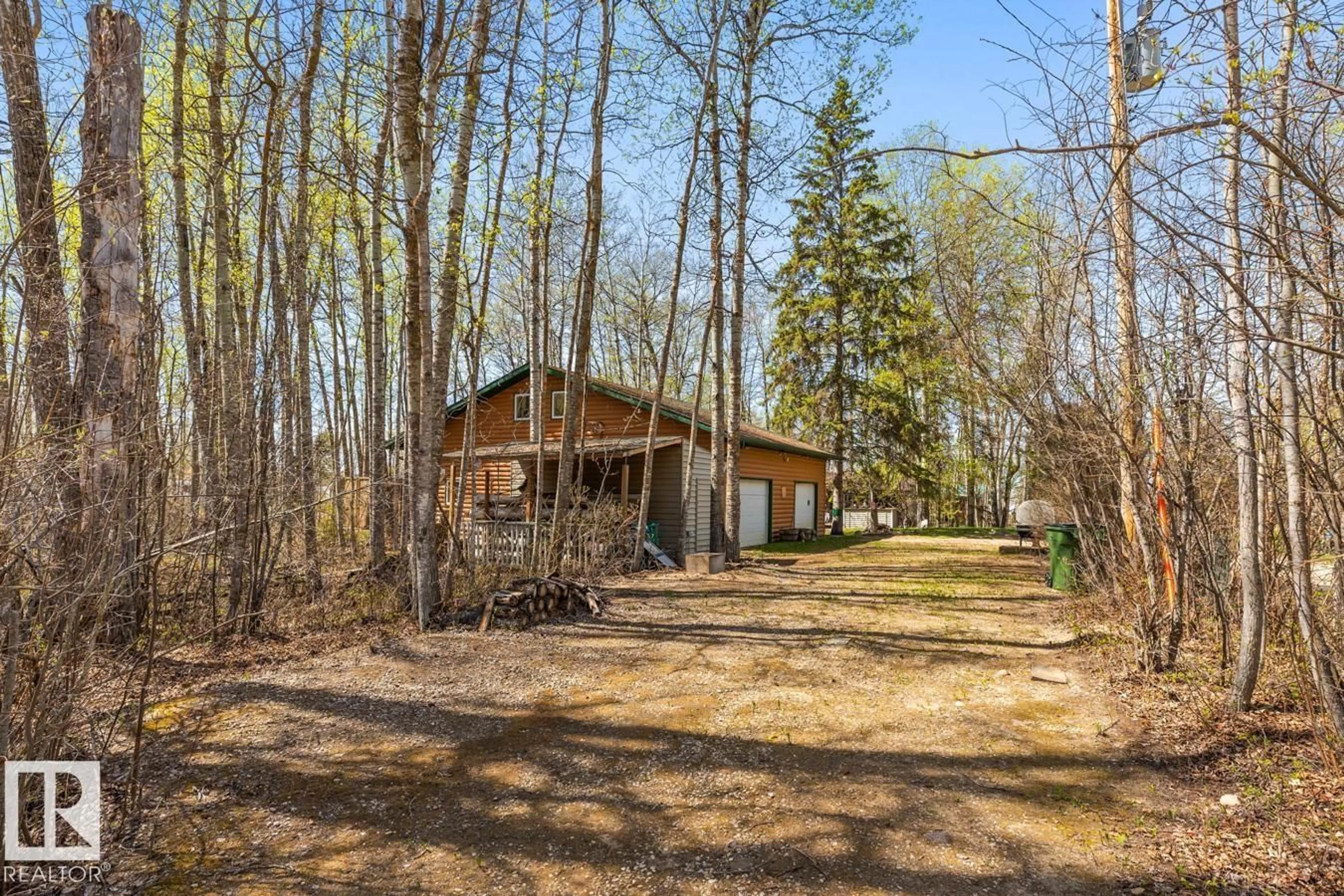 A pic from outside/outdoor area/front of a property/back of a property/a pic from drone, forest/trees view for 1 POPLAR AV, Rural Lac Ste. Anne County Alberta T0E0V0