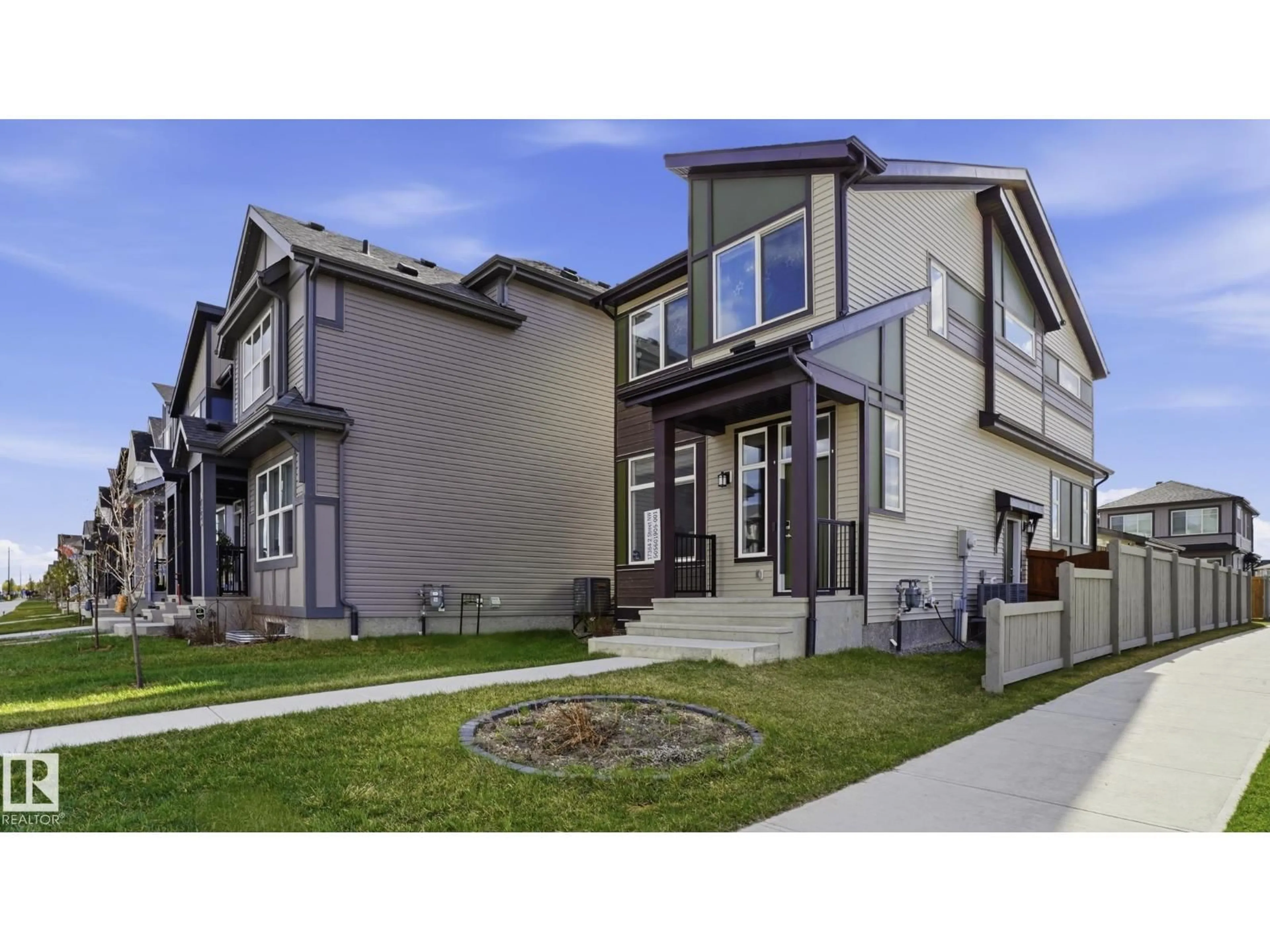 Home with vinyl exterior material, street for NW - 17364 2 ST, Edmonton Alberta T5Y4G6